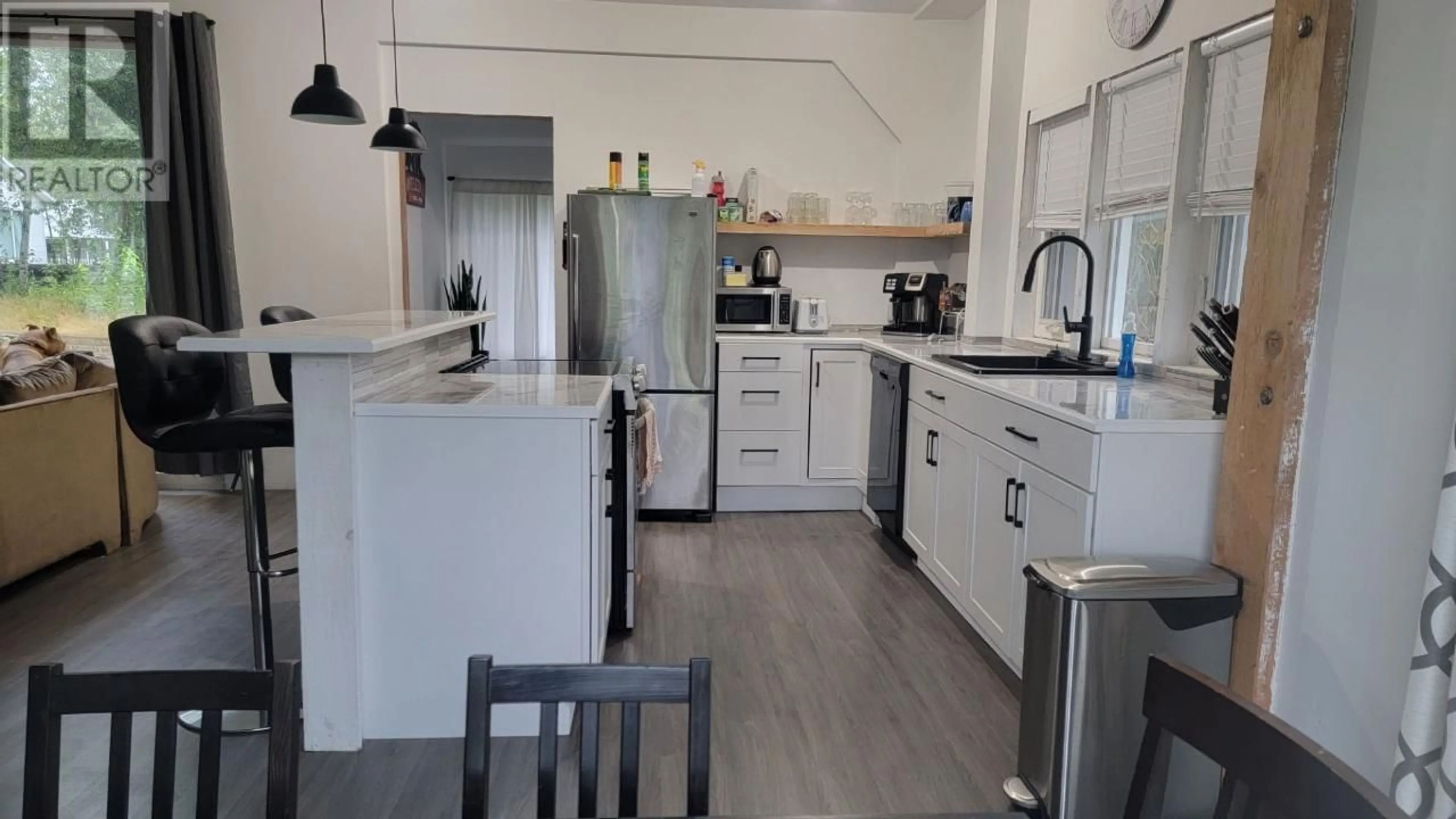 Kitchen, wood floors, cottage for 897 Main Street, Blue River British Columbia V0E1J0