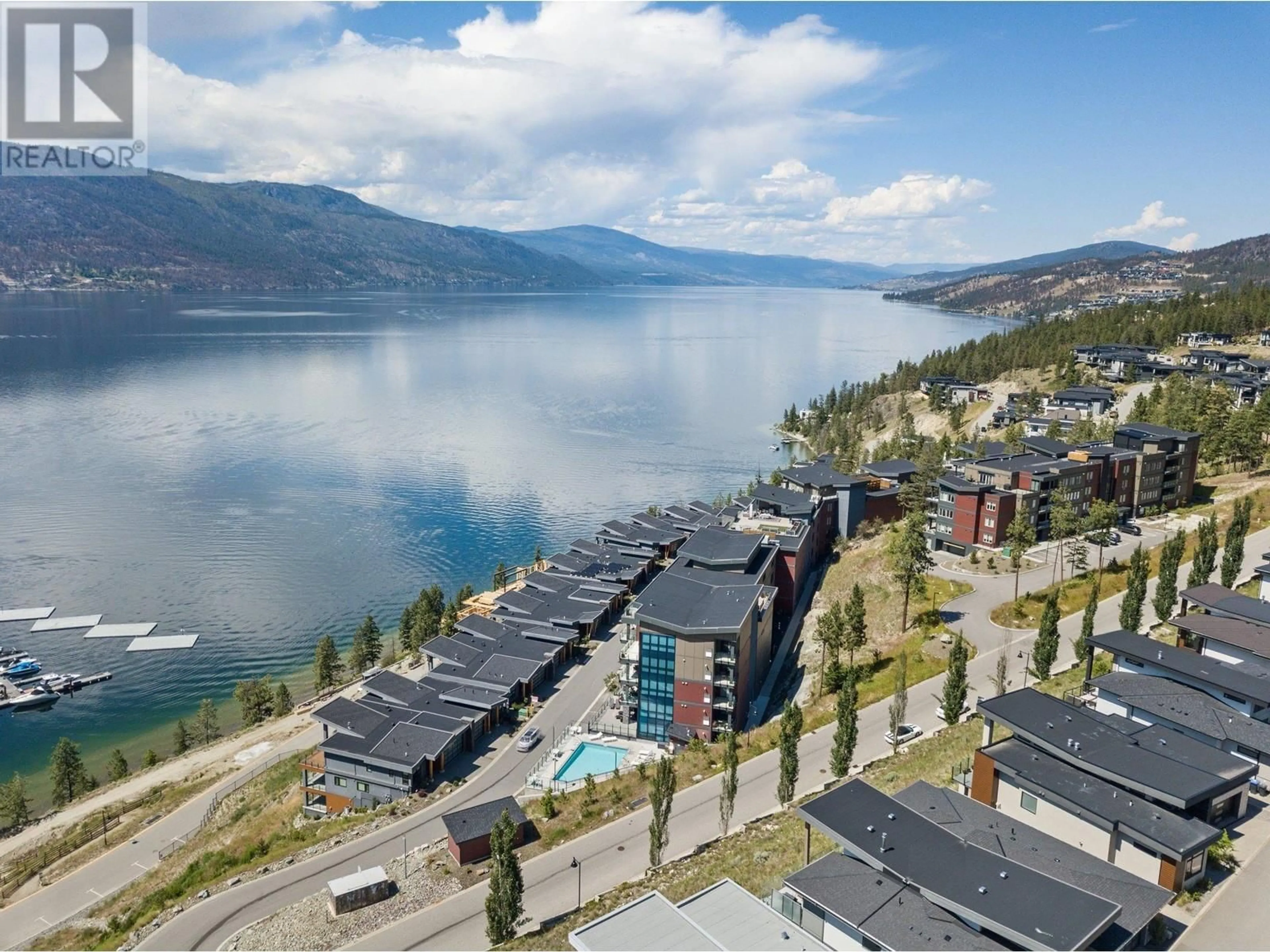 A pic from outside/outdoor area/front of a property/back of a property/a pic from drone, water/lake/river/ocean view for 316 - 3475 GRANITE CLOSE, Kelowna British Columbia V1V0B9