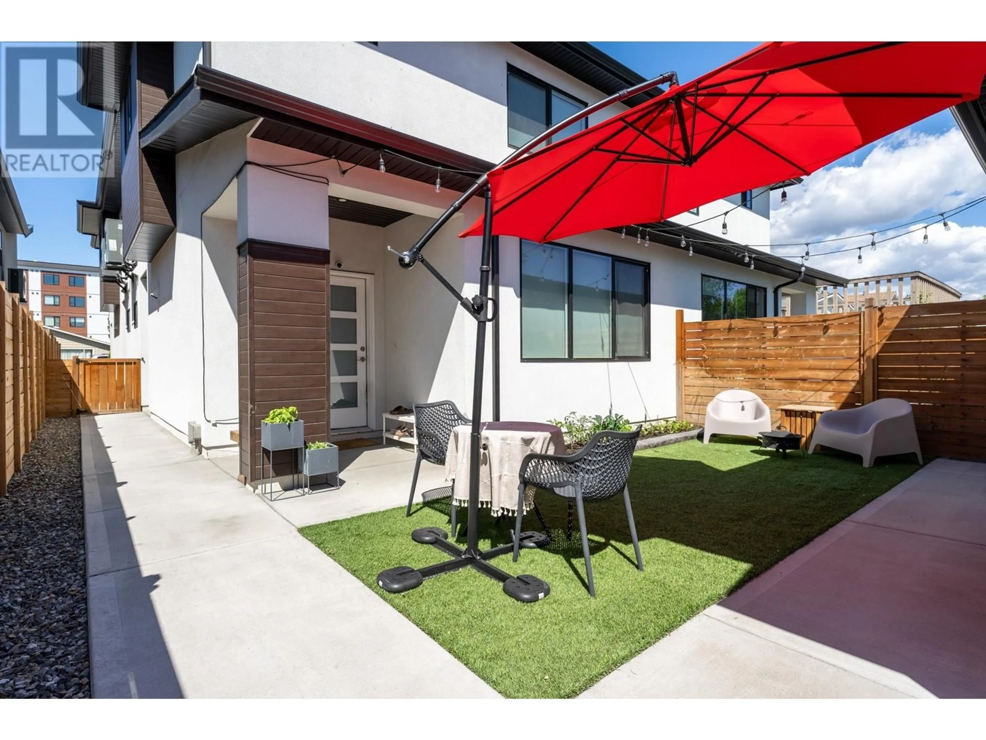 Patio, the fenced backyard for 2973 Conlin Court Unit# 4, Kelowna British Columbia V1Y7S7