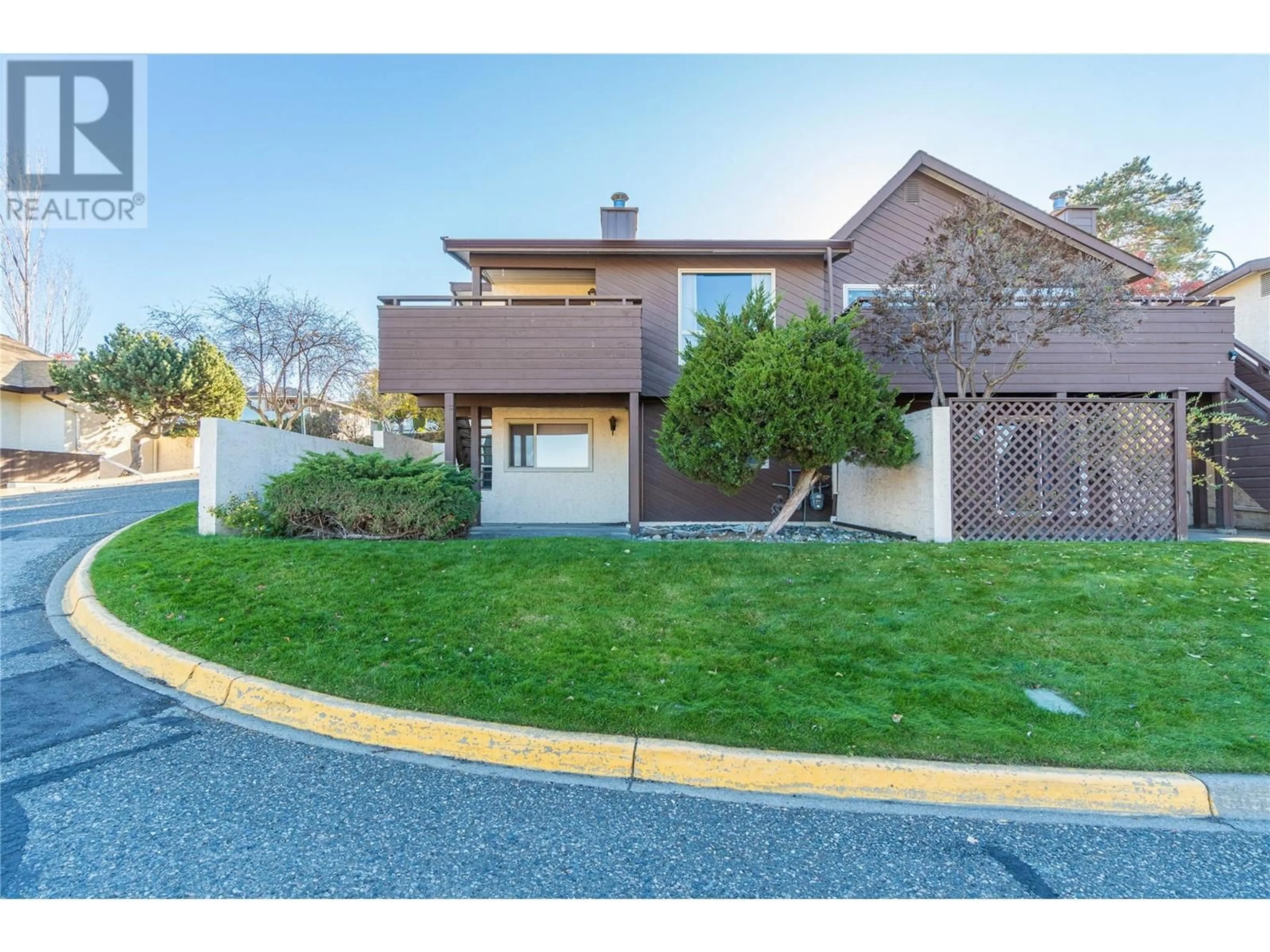 Frontside or backside of a home, the street view for 250 Pemberton Terrace Unit# 1, Kamloops British Columbia V2C6A9