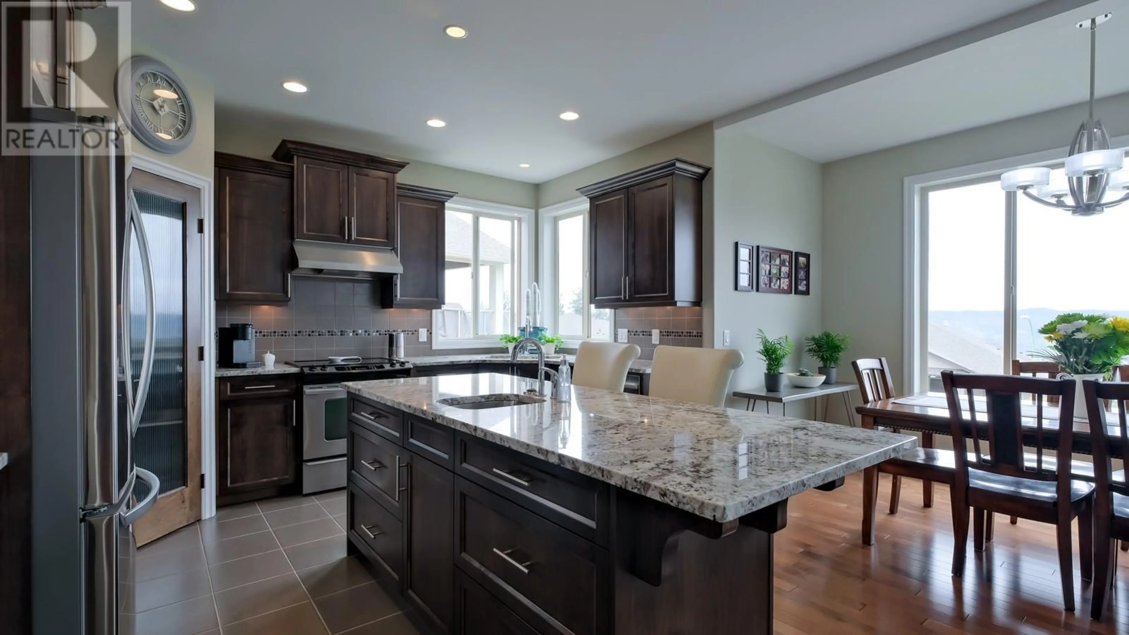 Contemporary kitchen, ceramic/tile floor for 3087 Sageview Road, West Kelowna British Columbia V4T3H2