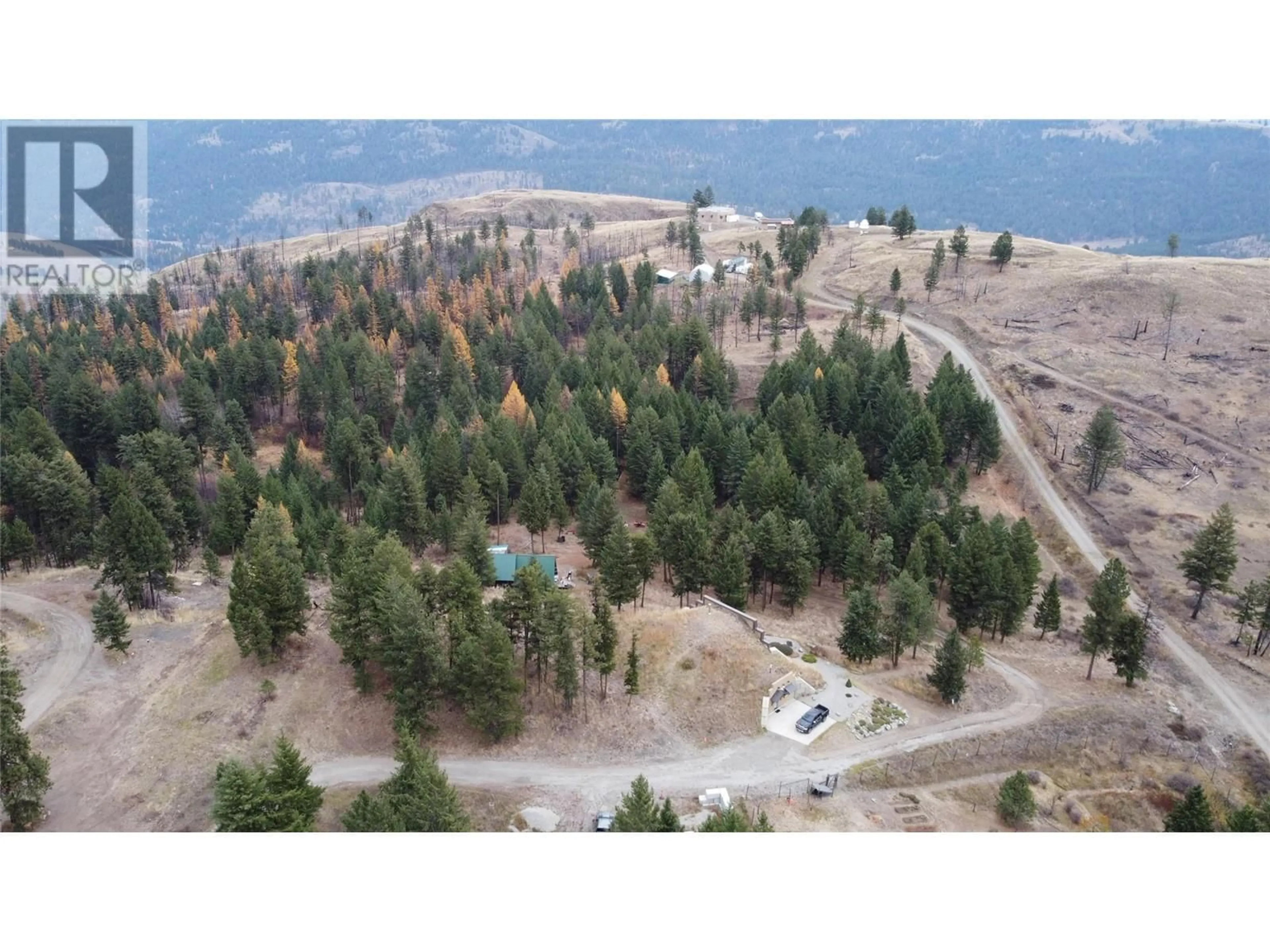 A pic from outside/outdoor area/front of a property/back of a property/a pic from drone, water/lake/river/ocean view for 1910 HULME CREEK ROAD, Rock Creek British Columbia V0H1Y0