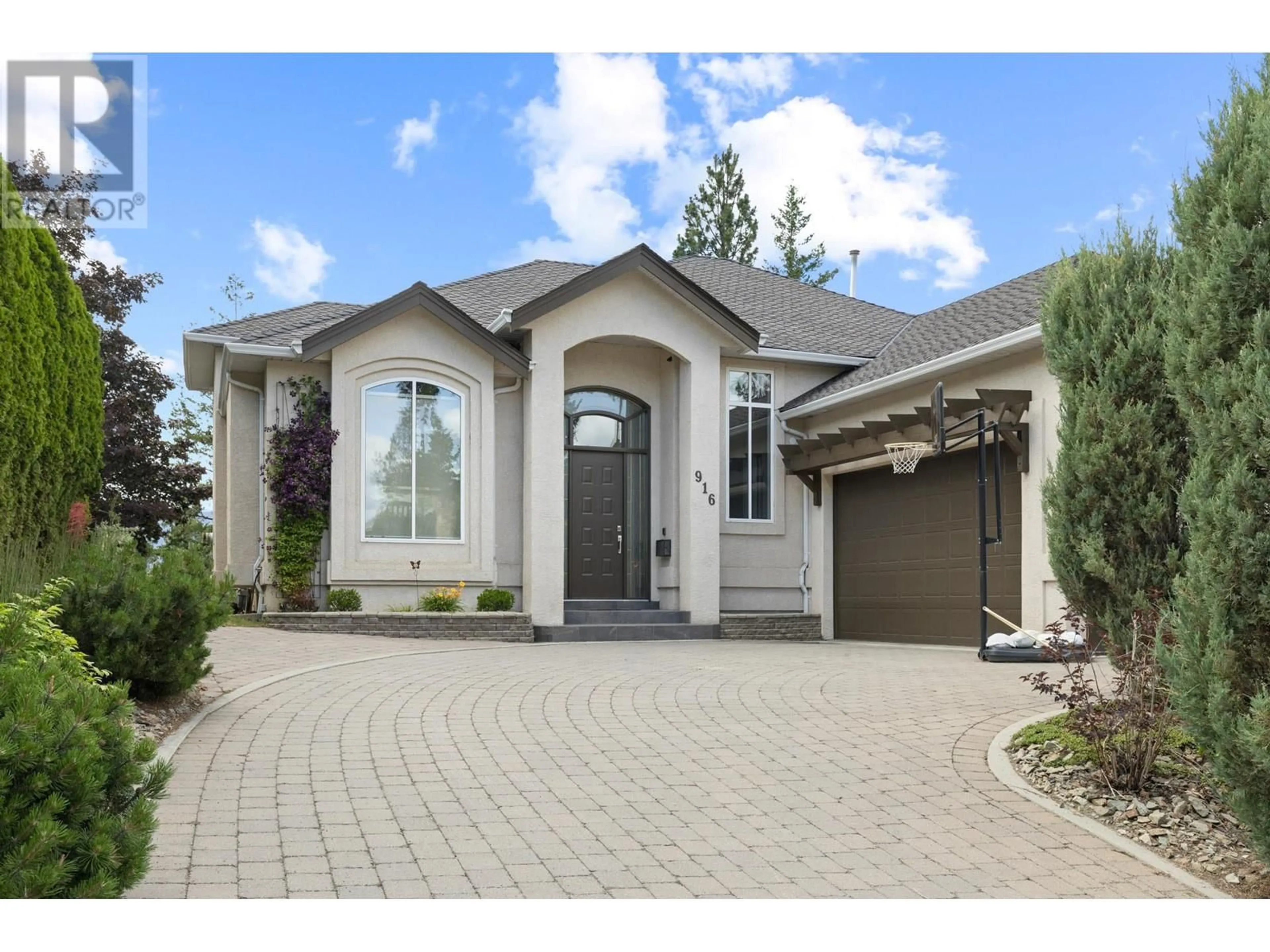 Frontside or backside of a home, cottage for 916 Skeena Drive, Kelowna British Columbia V1V2B3