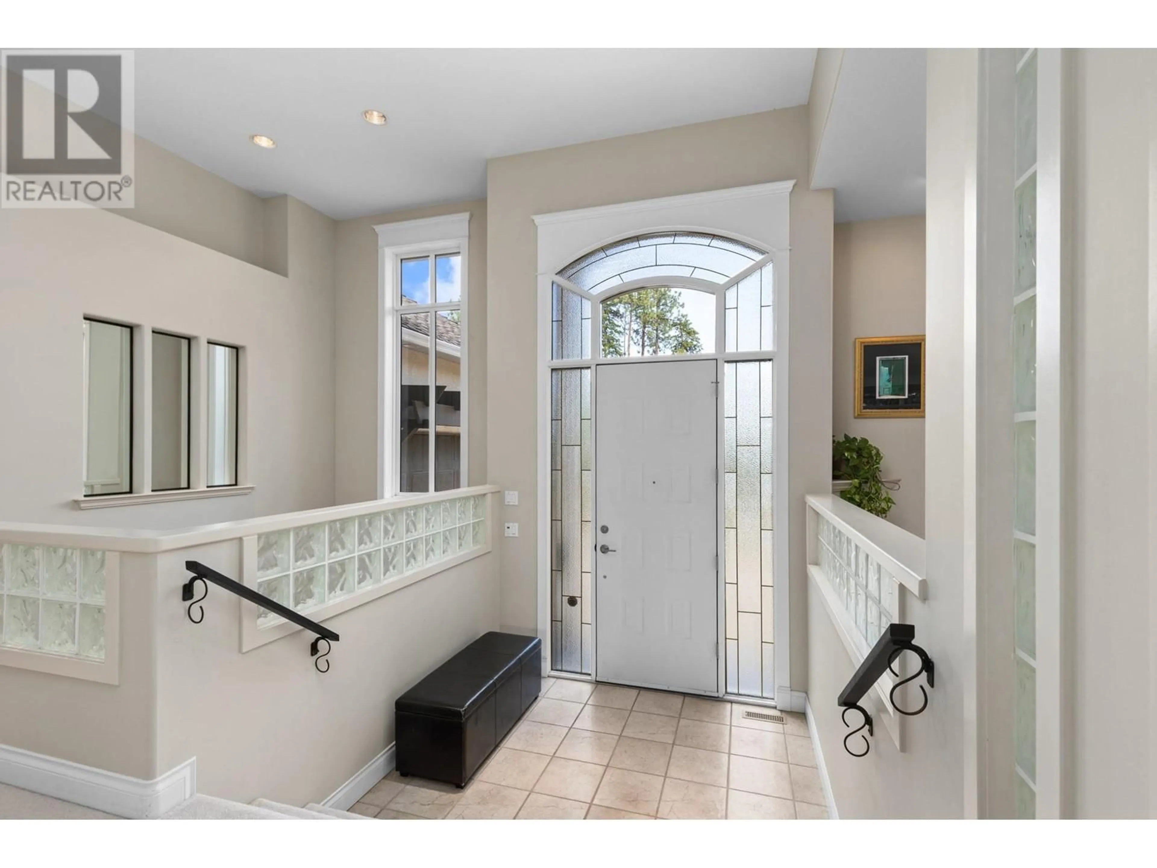 Indoor entryway, ceramic floors for 916 Skeena Drive, Kelowna British Columbia V1V2B3