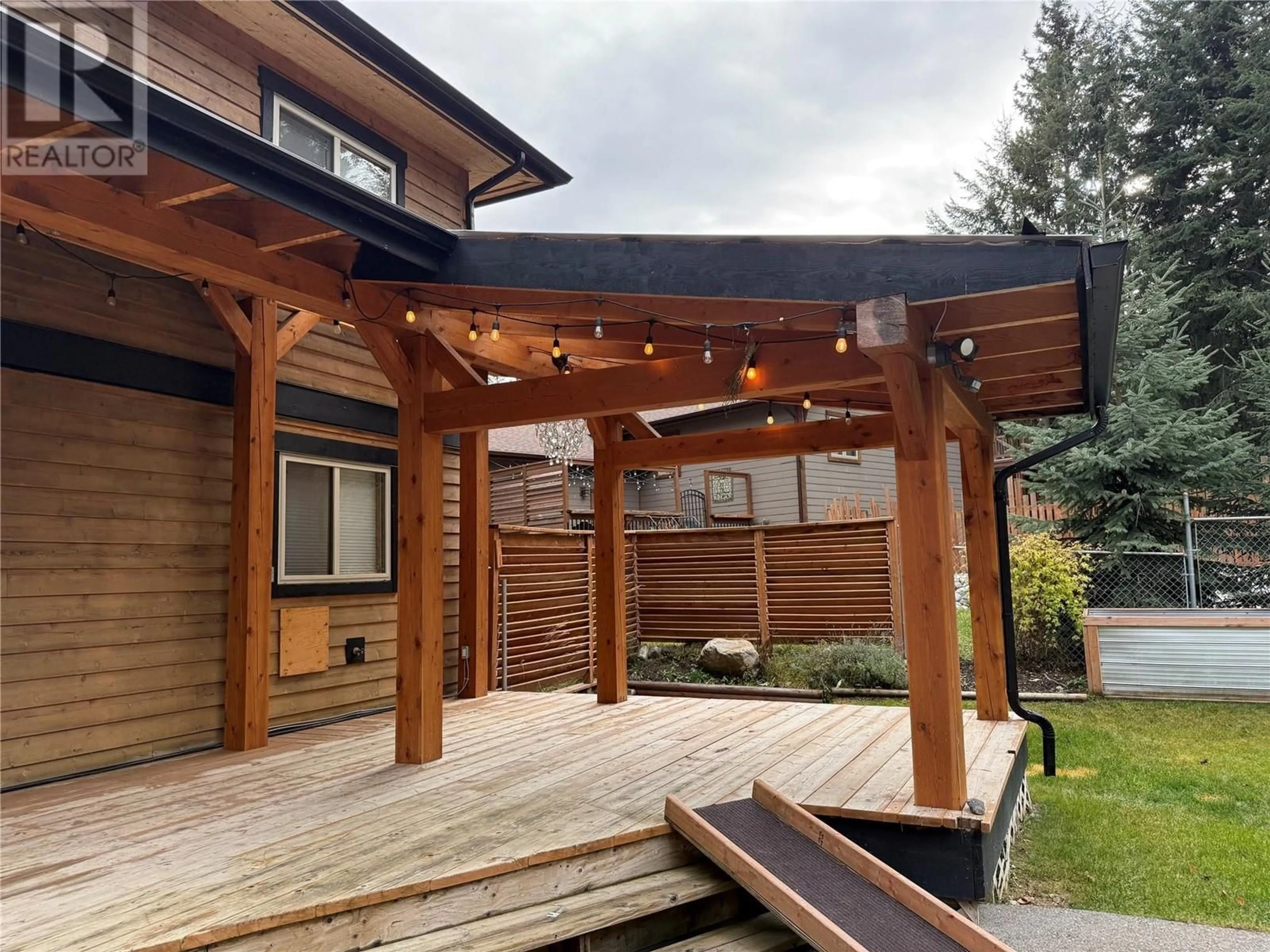 Patio, the fenced backyard for 1305 STONEY Lane, Golden British Columbia V0A1H3