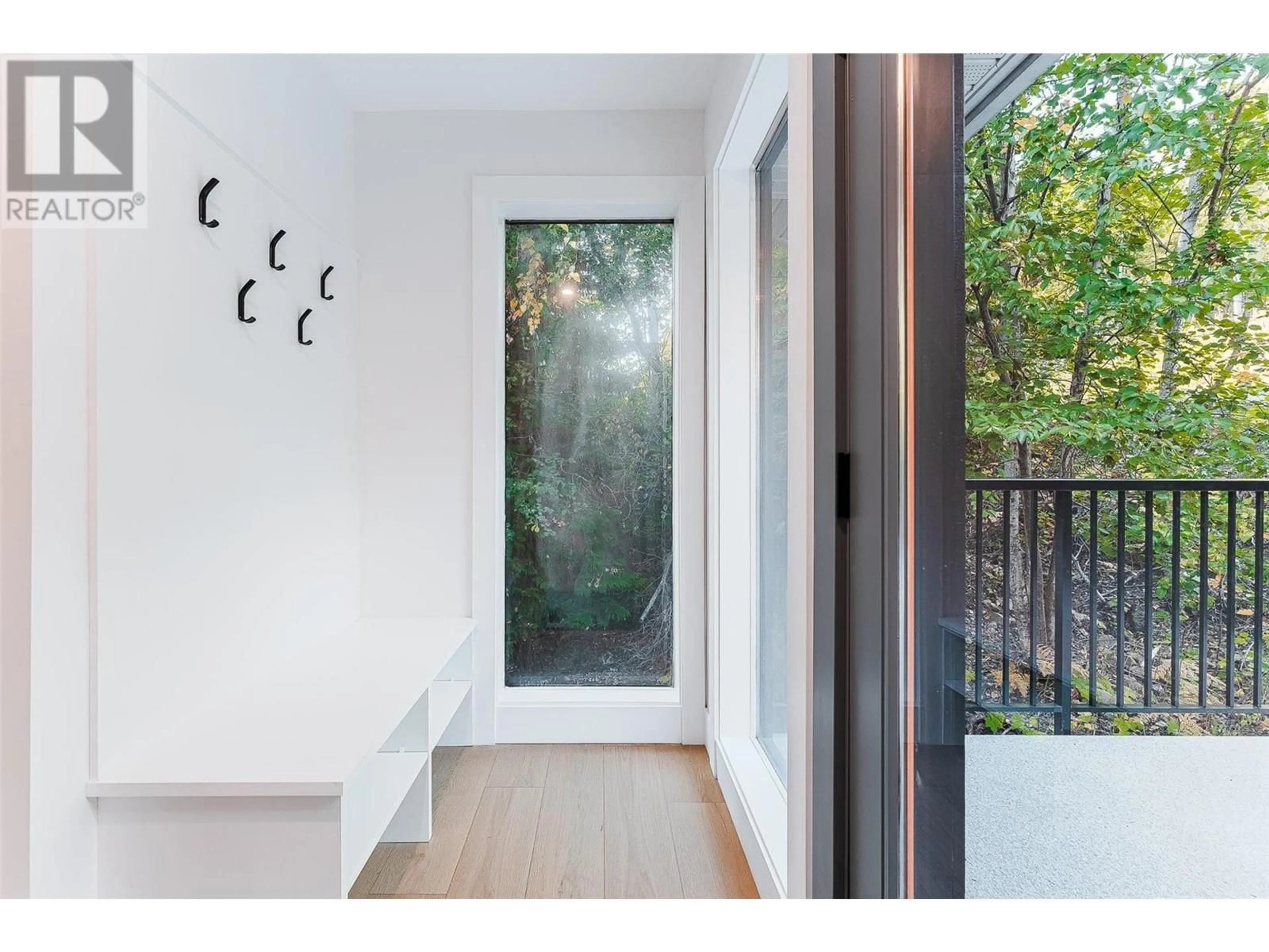 Indoor entryway, wood floors for 7418 Crowfoot Drive, Anglemont British Columbia V0E1M8