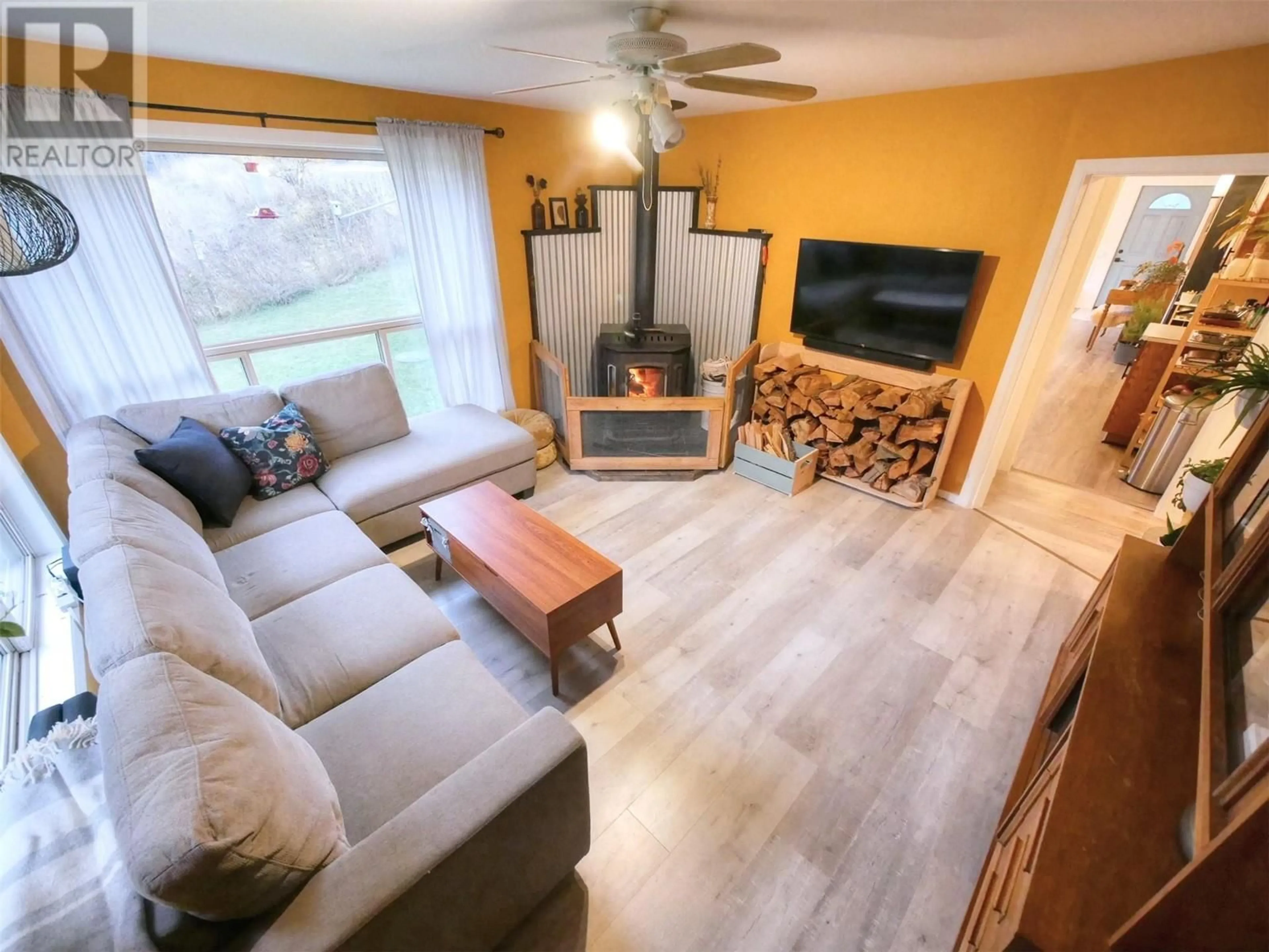 Living room, wood floors for 3064 Upper Slocan Park Road, Slocan Park British Columbia V0G2E0