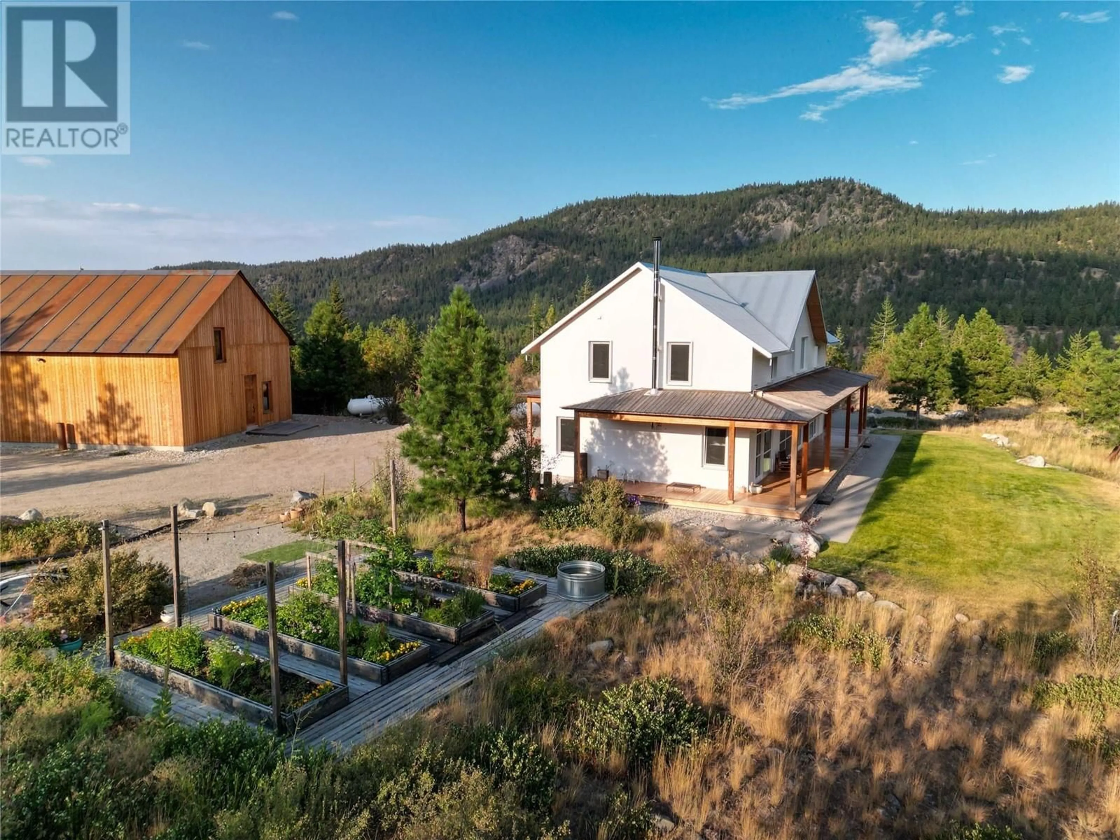 A pic from outside/outdoor area/front of a property/back of a property/a pic from drone, mountain view for 8025 PRINCETON-SUMMERLAND ROAD, Summerland British Columbia V0H1Z8