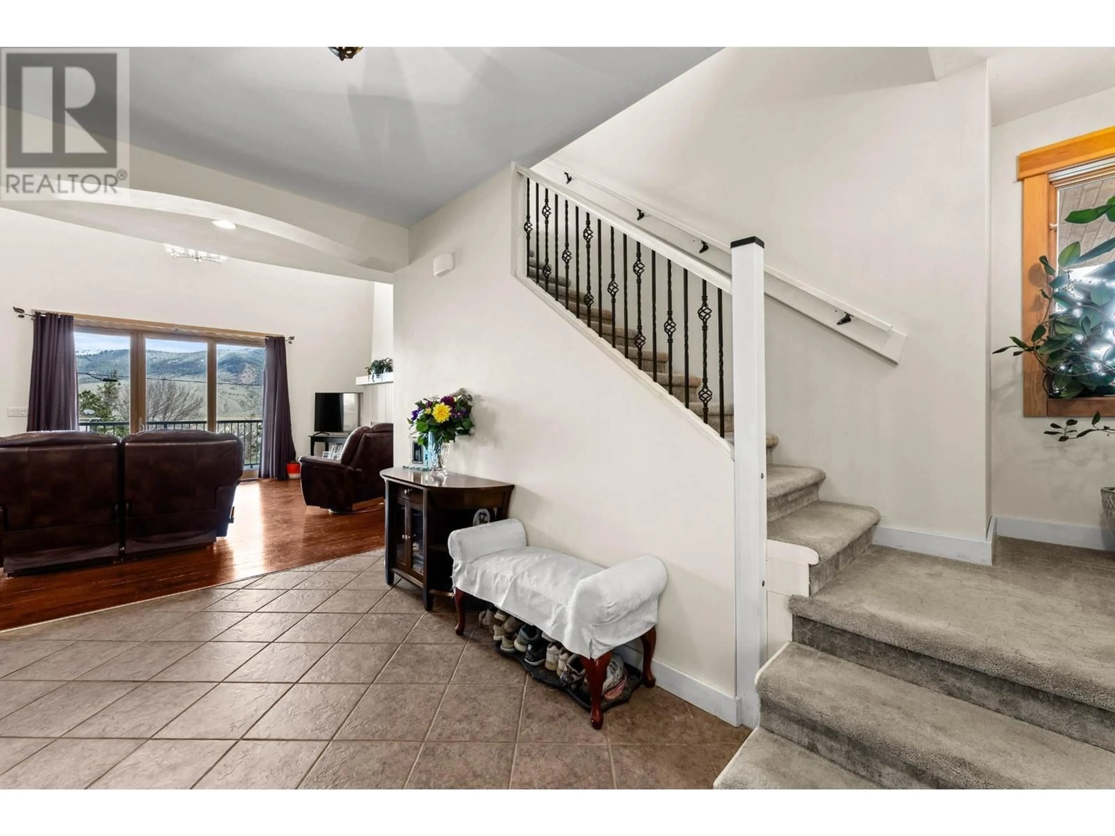 Indoor entryway, wood floors for 4752 Uplands Drive, Kamloops British Columbia V2C6S9