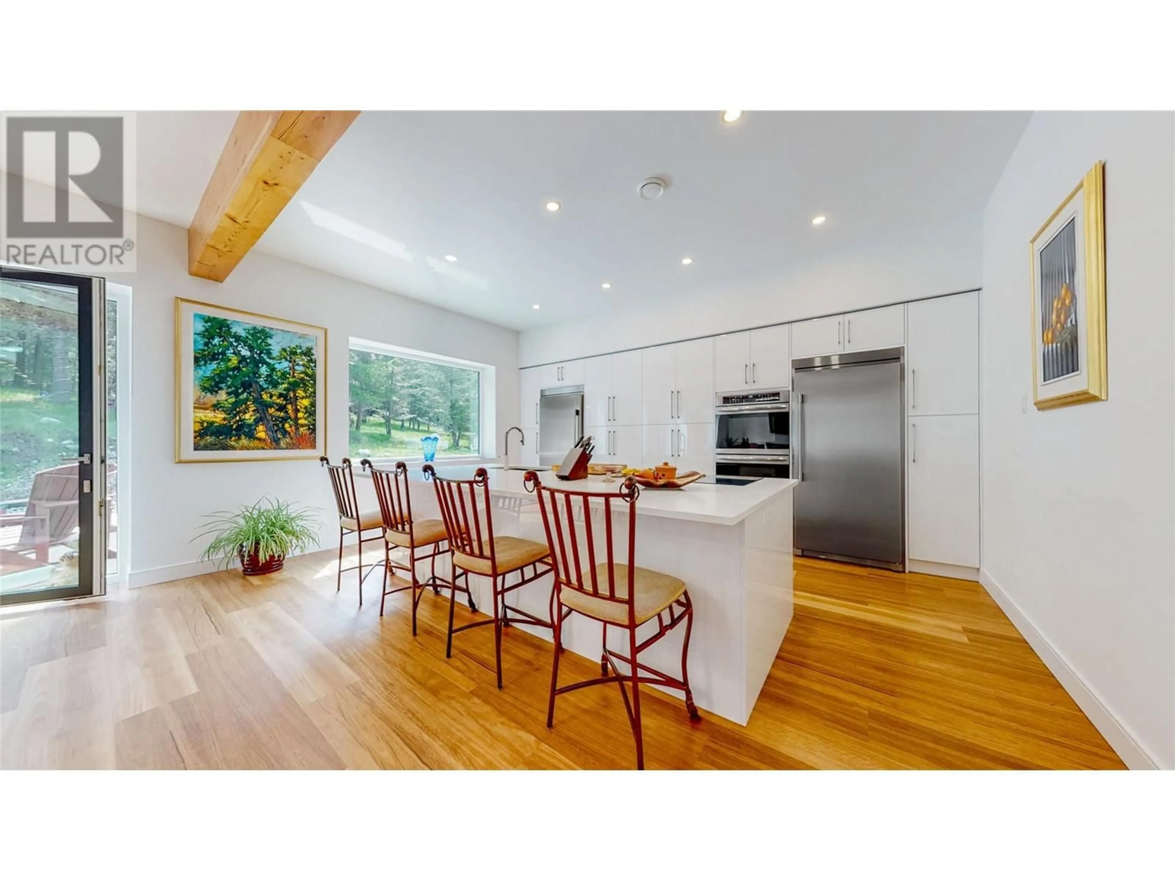 Open concept kitchen, wood/laminate floor for 1324 TIMBERWOLF TRAIL ROAD, Bridesville British Columbia V0H1Y0