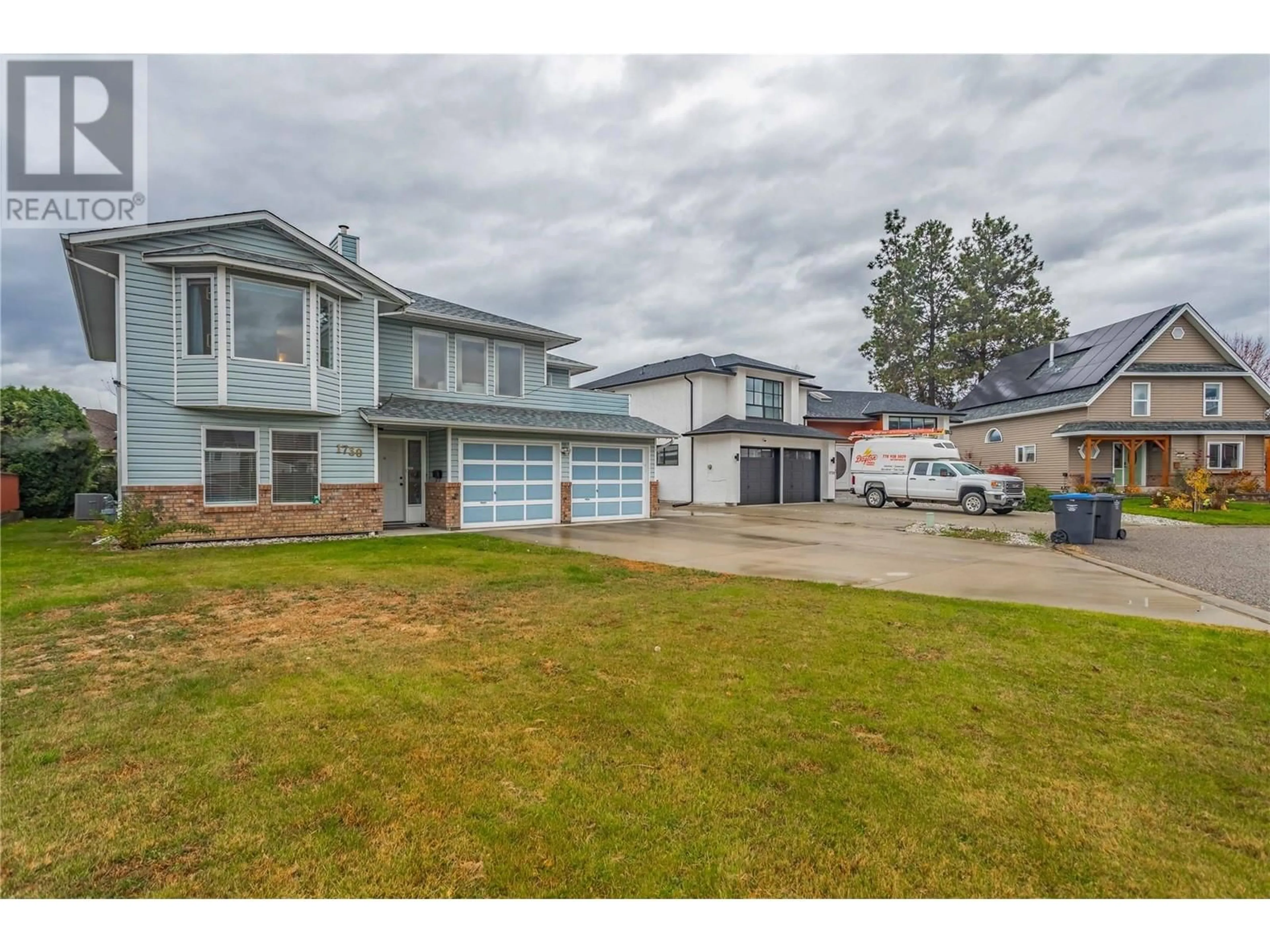 Frontside or backside of a home, the street view for 1730 Simpson Court, Kelowna British Columbia V1X7C1