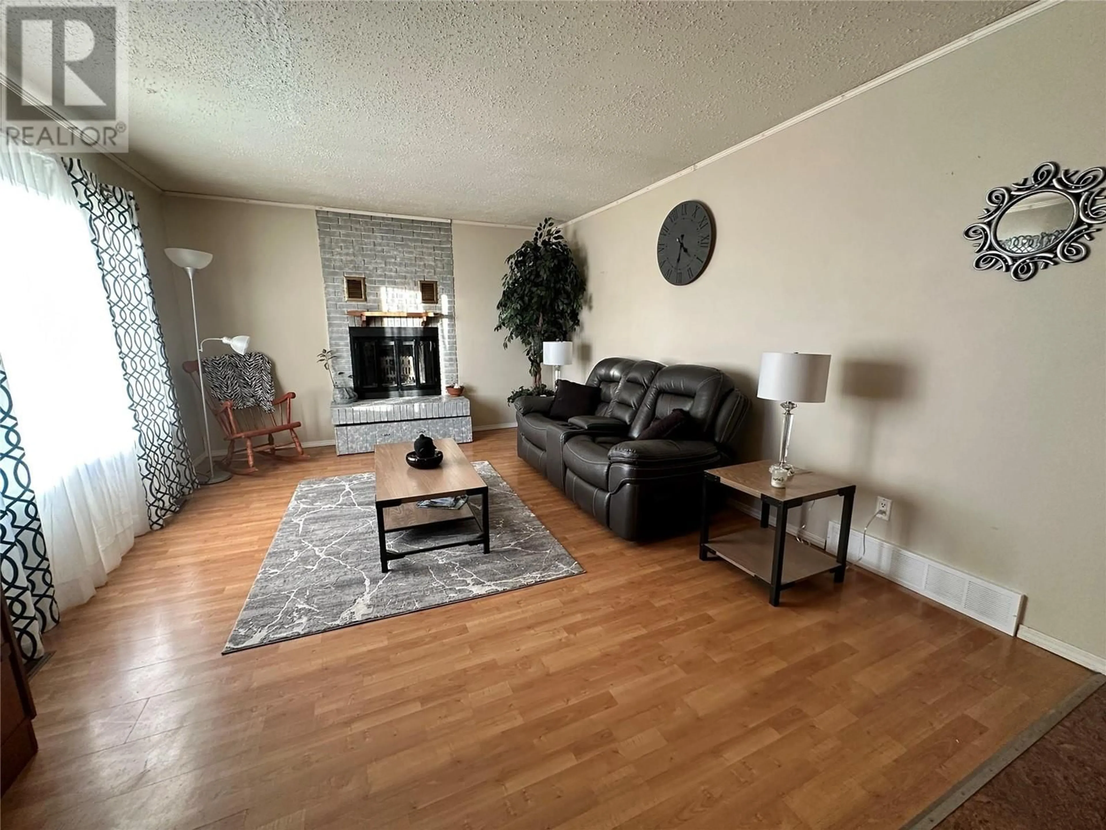 Living room with furniture, unknown for 416 100A AVENUE, Dawson Creek British Columbia V1G1X6