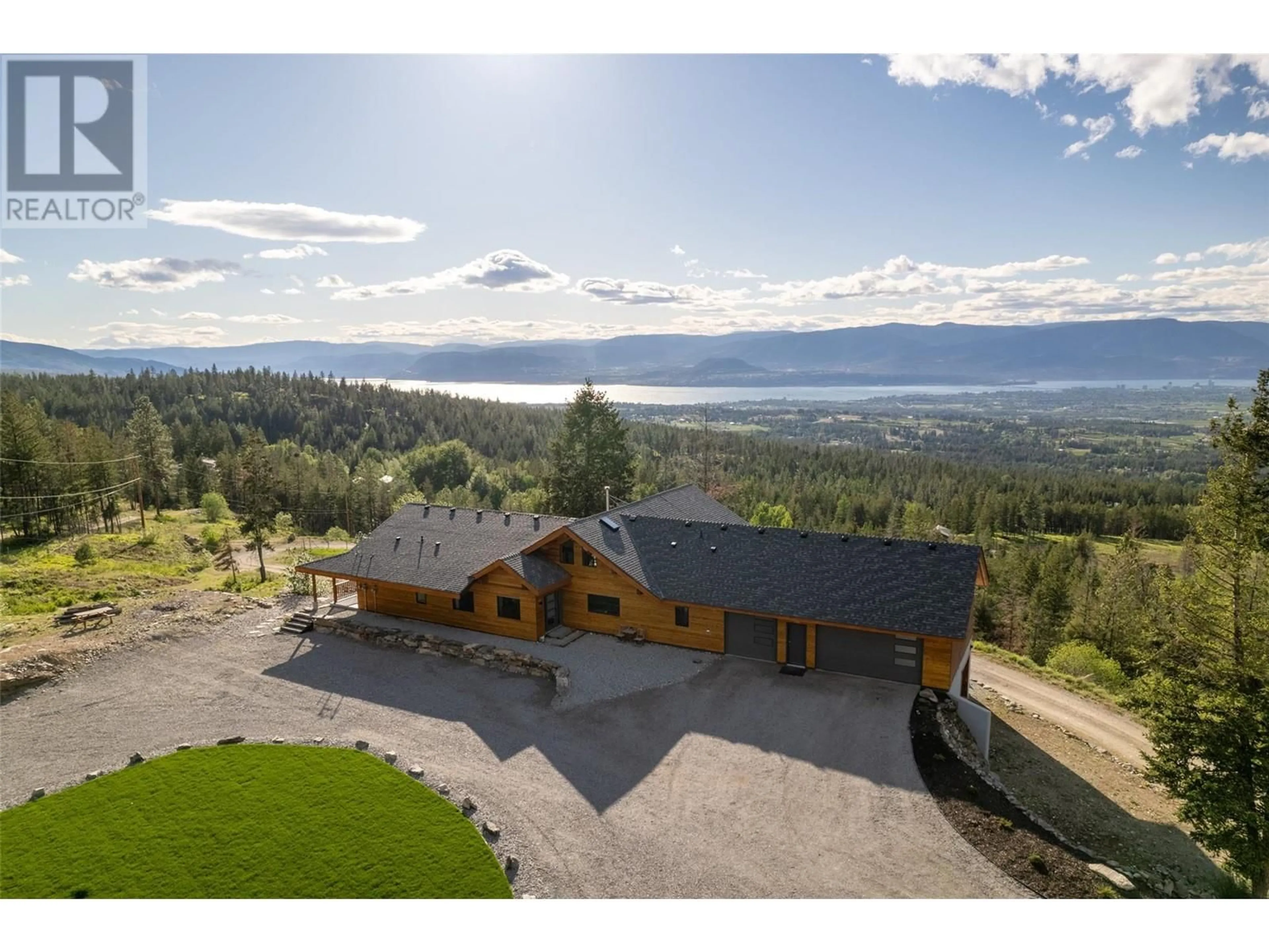 Frontside or backside of a home, cottage for 4519 June Springs Road, Kelowna British Columbia V1W4C8