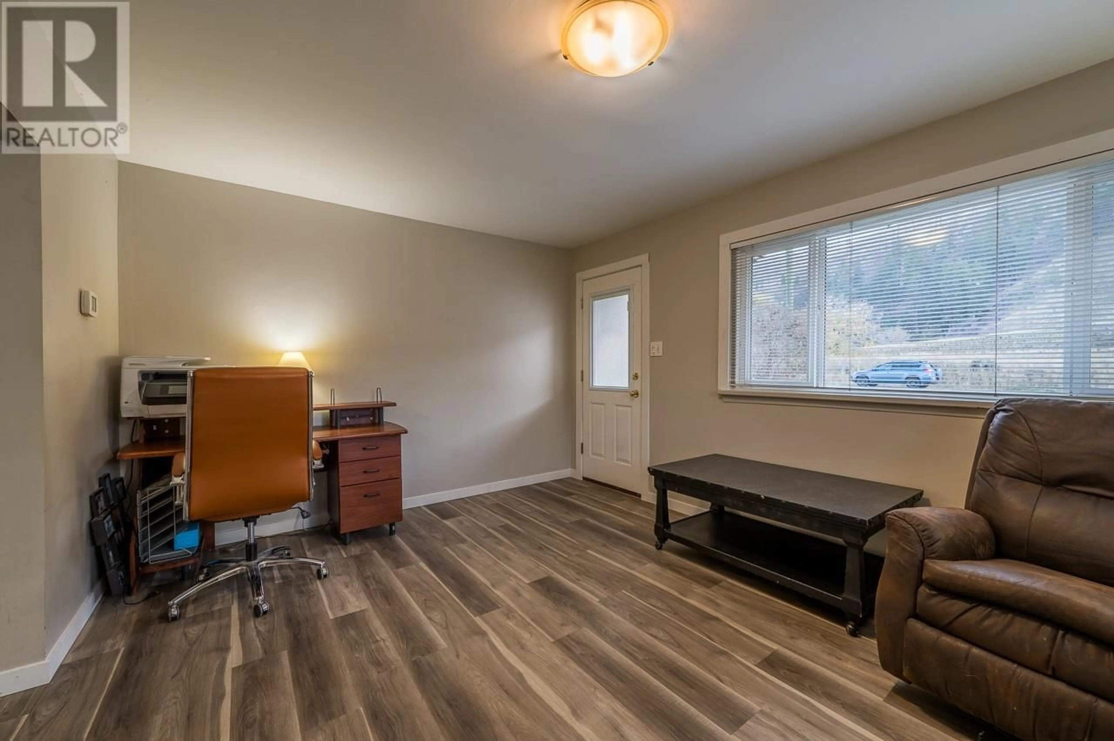 A pic of a room, wood floors for 4085 Yellowhead Highway, Kamloops British Columbia V2H1K7