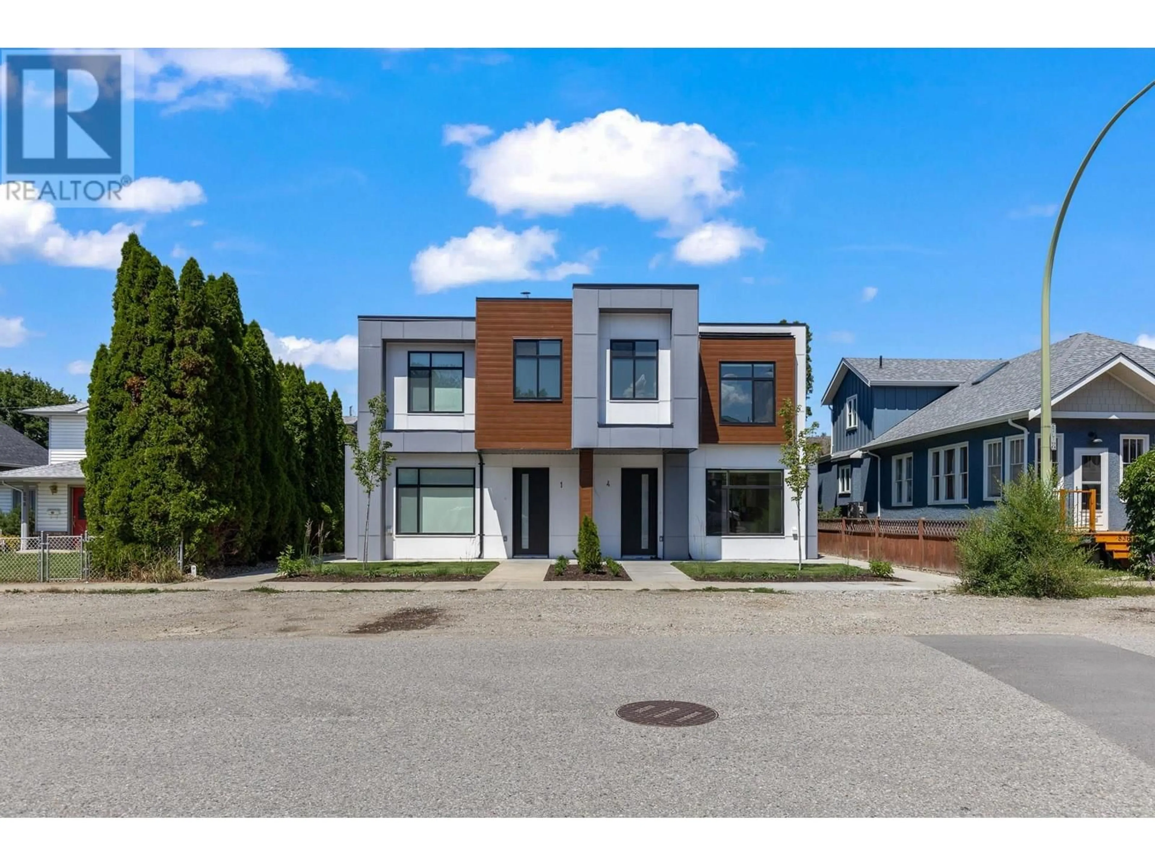 Frontside or backside of a home, the street view for 830 Lawson Avenue Unit# 2, Kelowna British Columbia V1Y6S8