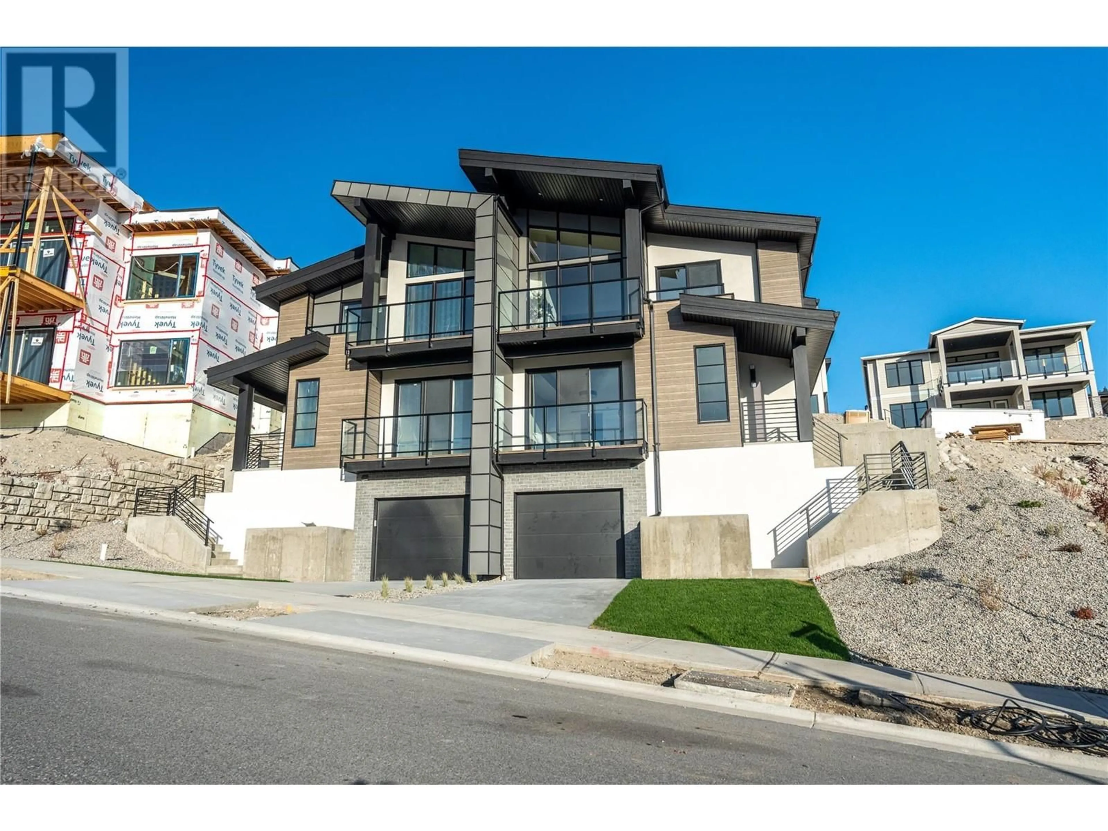 A pic from exterior of the house or condo, the street view for 1100 Antler Drive Unit# 102, Penticton British Columbia V2A0C9