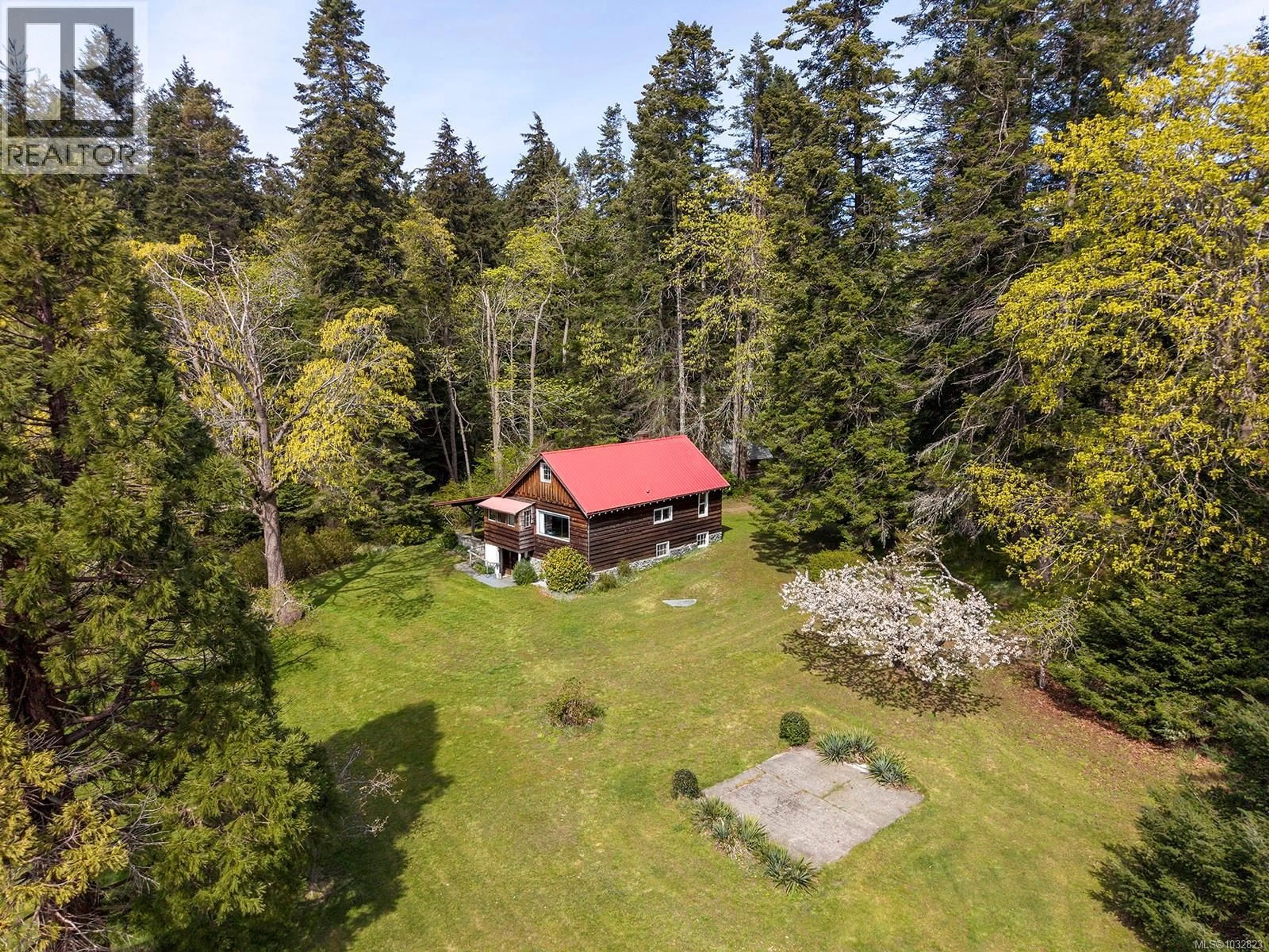 A pic from outside/outdoor area/front of a property/back of a property/a pic from drone, forest/trees view for 1821 BUTLER ROAD, Comox British Columbia V9M4B4
