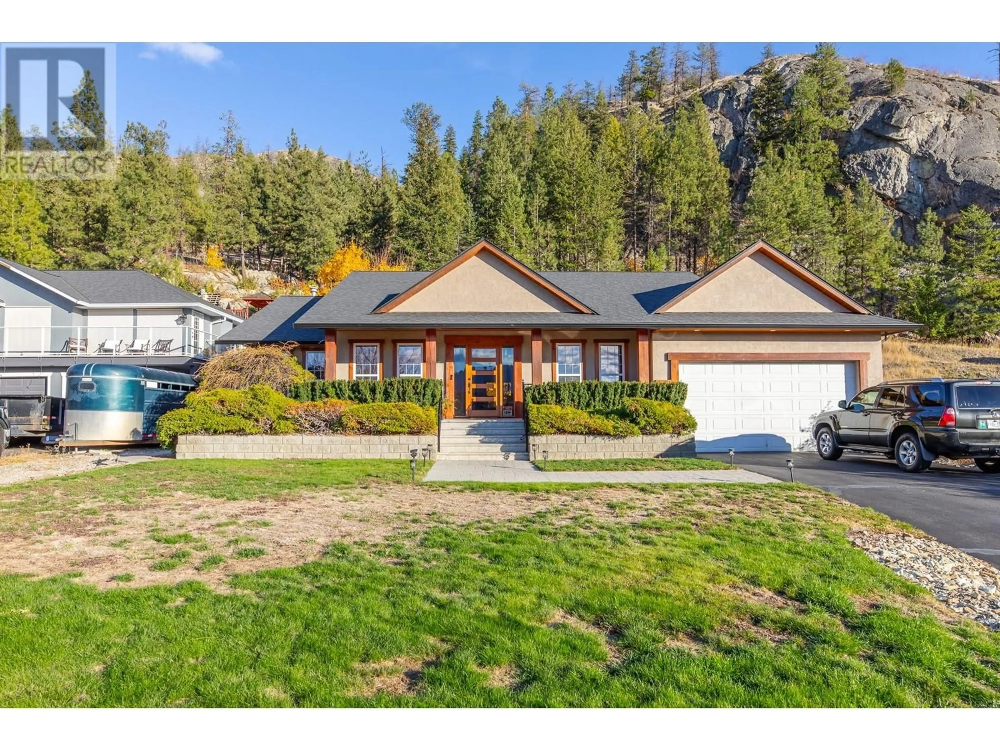 Frontside or backside of a home, cottage for 132 Christie Mountain Lane, Okanagan Falls British Columbia V0H1R3