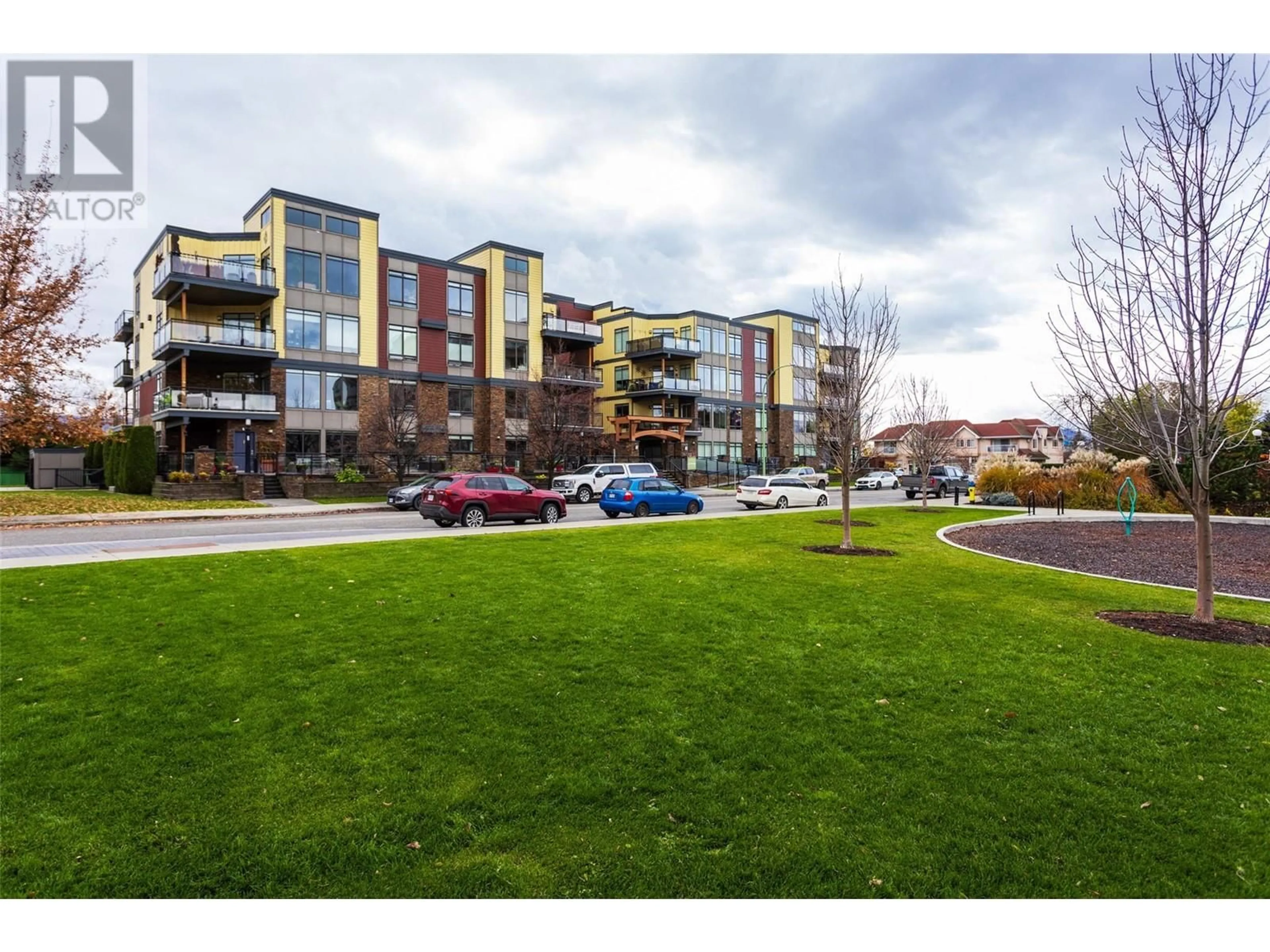 A pic from exterior of the house or condo, the street view for 2011 Agassiz Road Unit# 104, Kelowna British Columbia V1Y9Z8