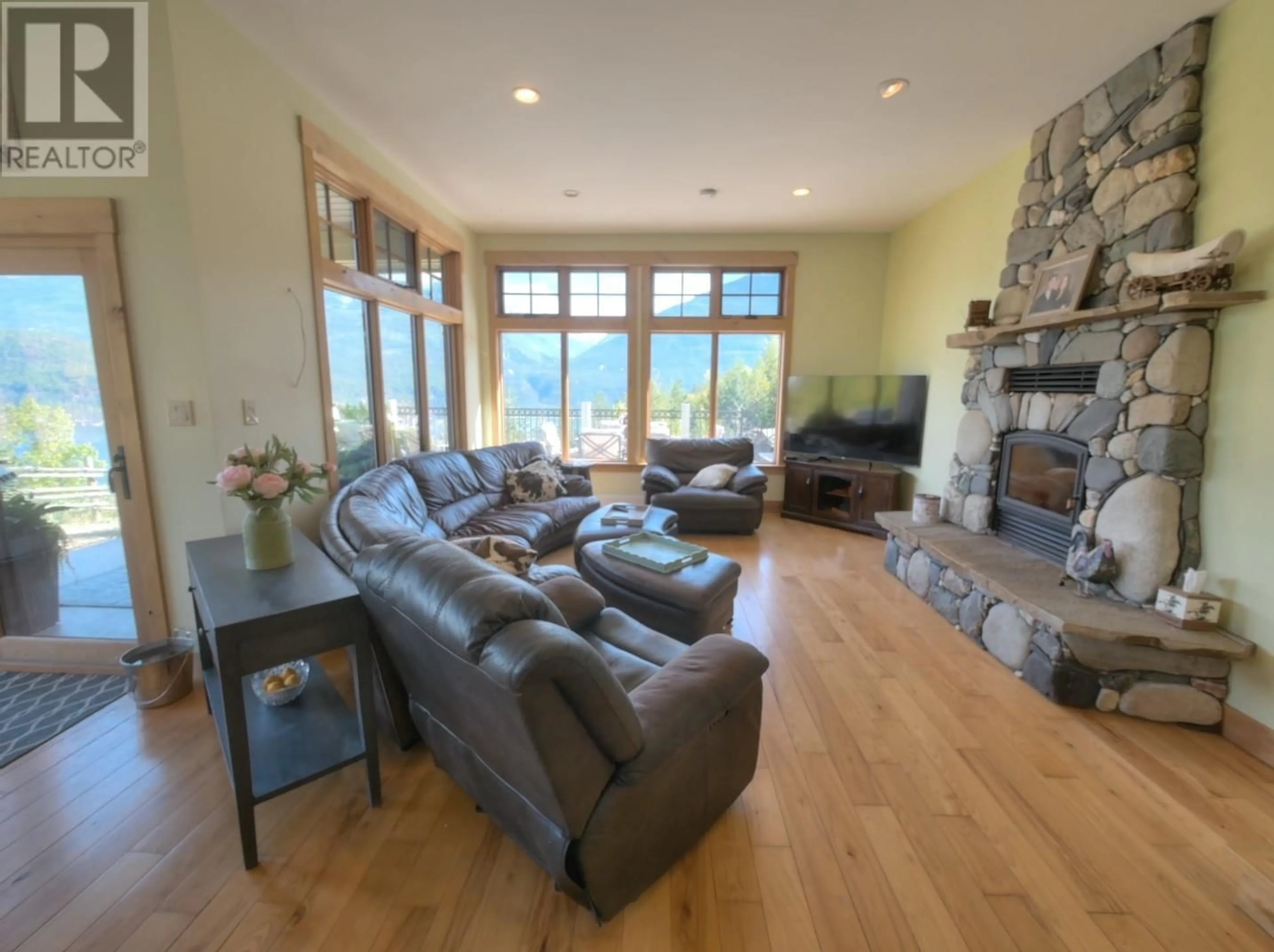 Living room, wood floors for 8840 Olson Road, Kaslo British Columbia V0G1M0