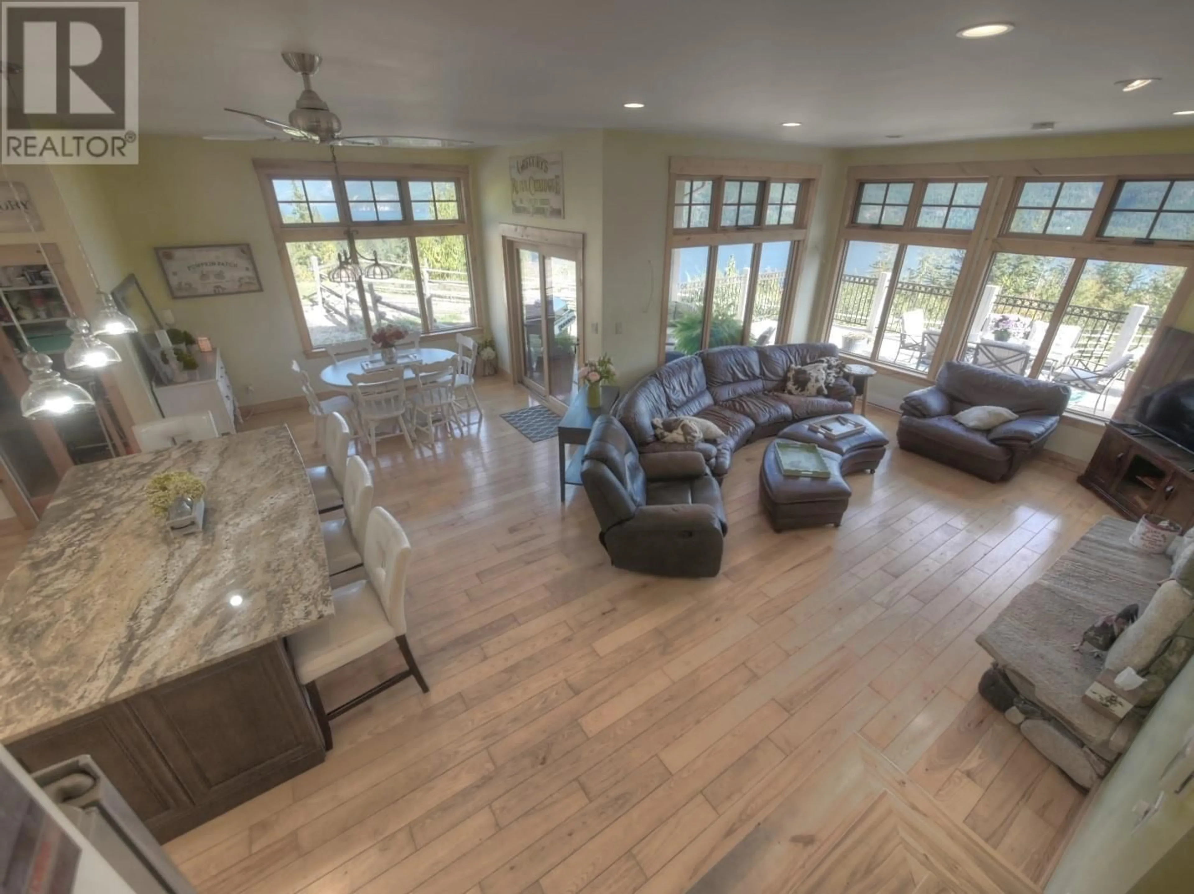 Living room, wood floors for 8840 Olson Road, Kaslo British Columbia V0G1M0