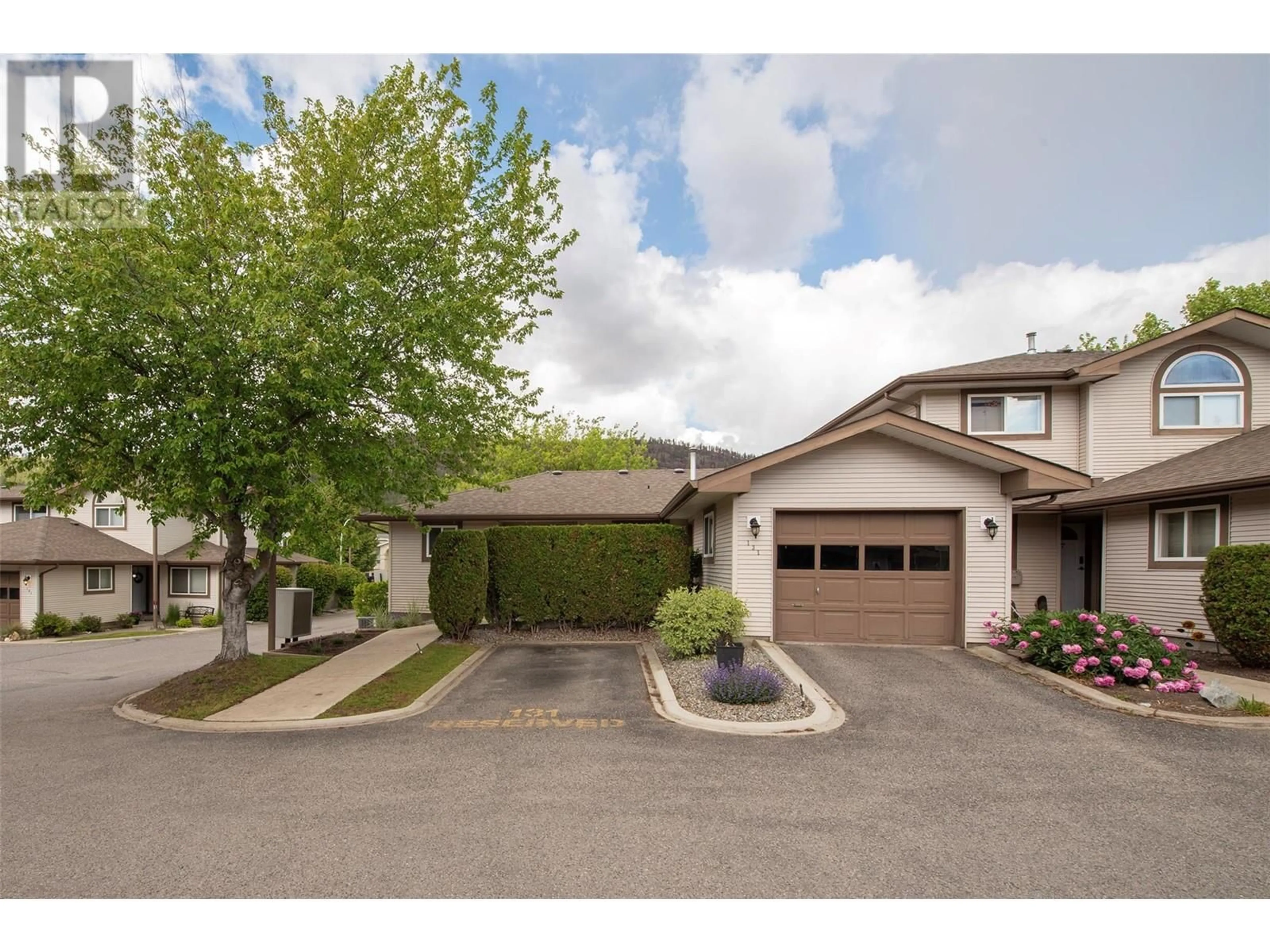 A pic from exterior of the house or condo, the street view for 133 Wyndham Crescent Unit# 131, Kelowna British Columbia V1V1Y8