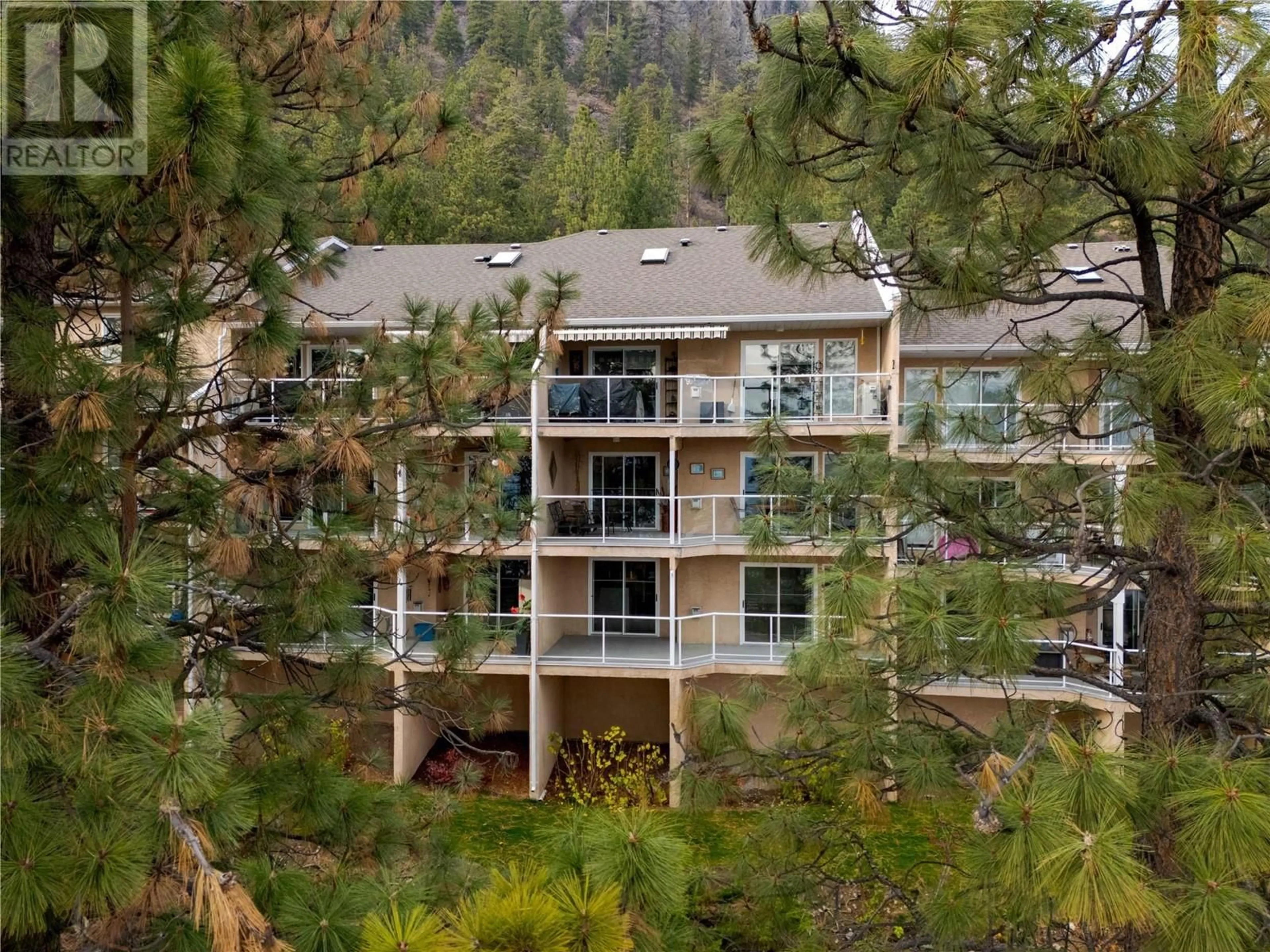 A pic from outside/outdoor area/front of a property/back of a property/a pic from drone, mountain view for 113 - 4630 PONDEROSA DRIVE, Peachland British Columbia V0H1X5