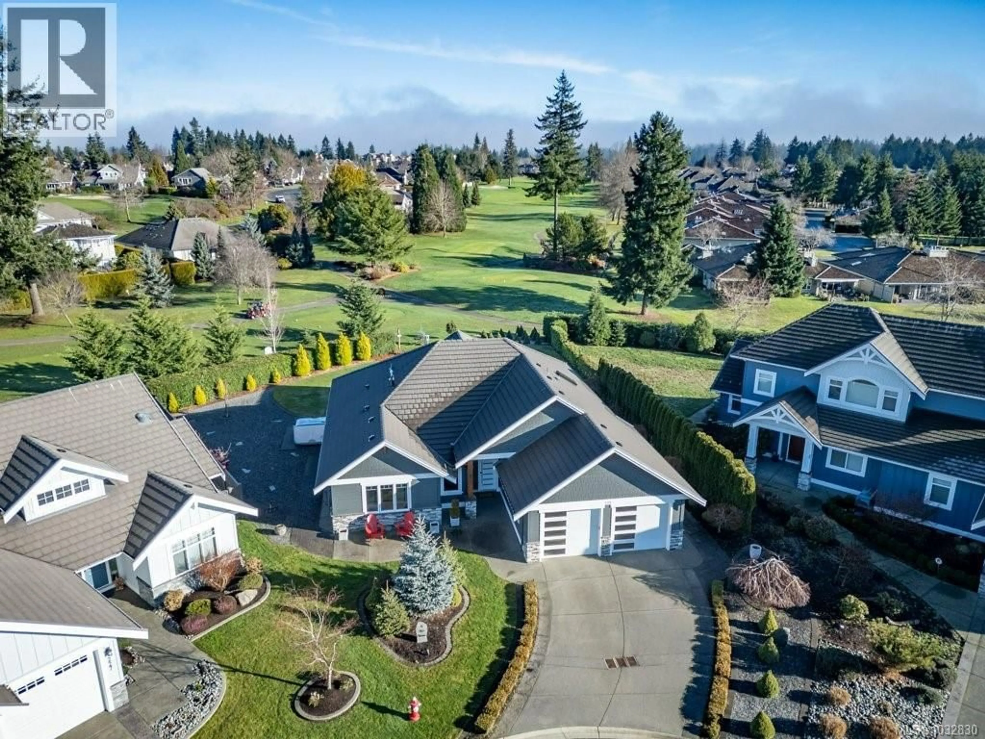 A pic from outside/outdoor area/front of a property/back of a property/a pic from drone, mountain view for 229 - 1290 CROWN ISLE DRIVE, Courtenay British Columbia V9N0B8
