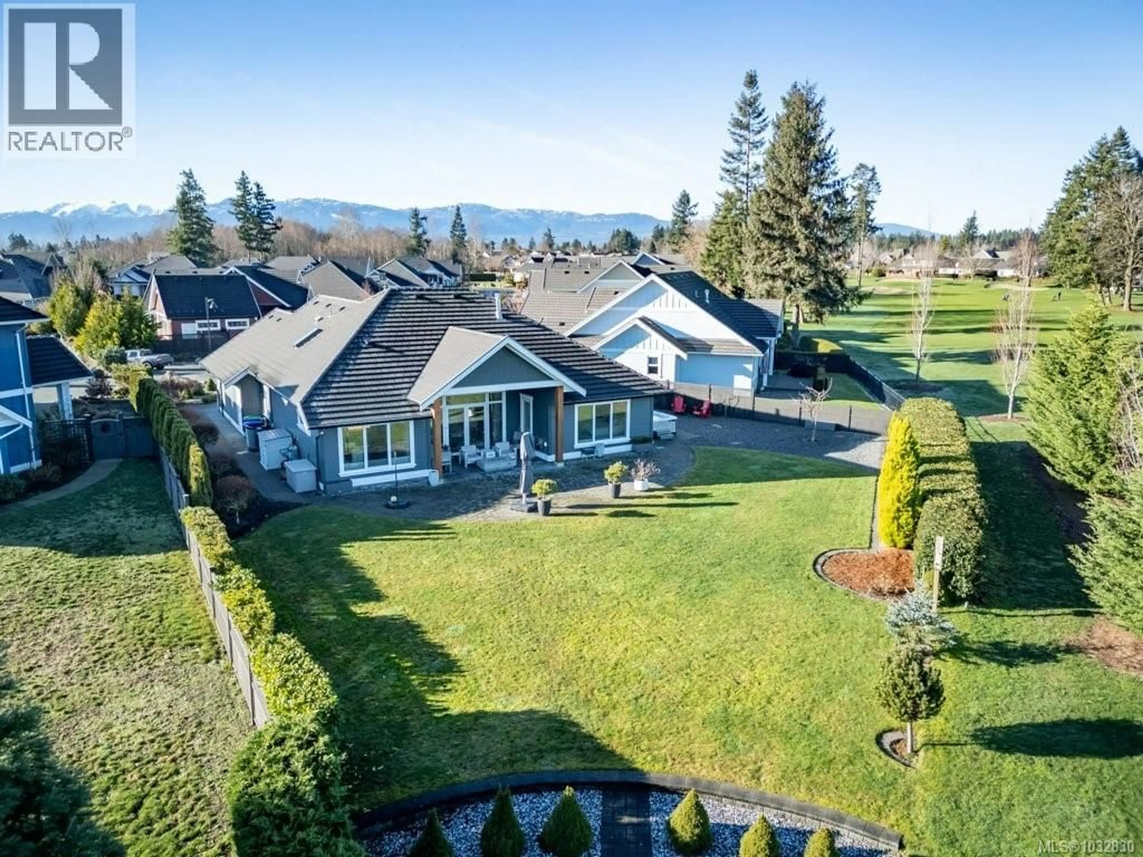 A pic from outside/outdoor area/front of a property/back of a property/a pic from drone, mountain view for 229 - 1290 CROWN ISLE DRIVE, Courtenay British Columbia V9N0B8