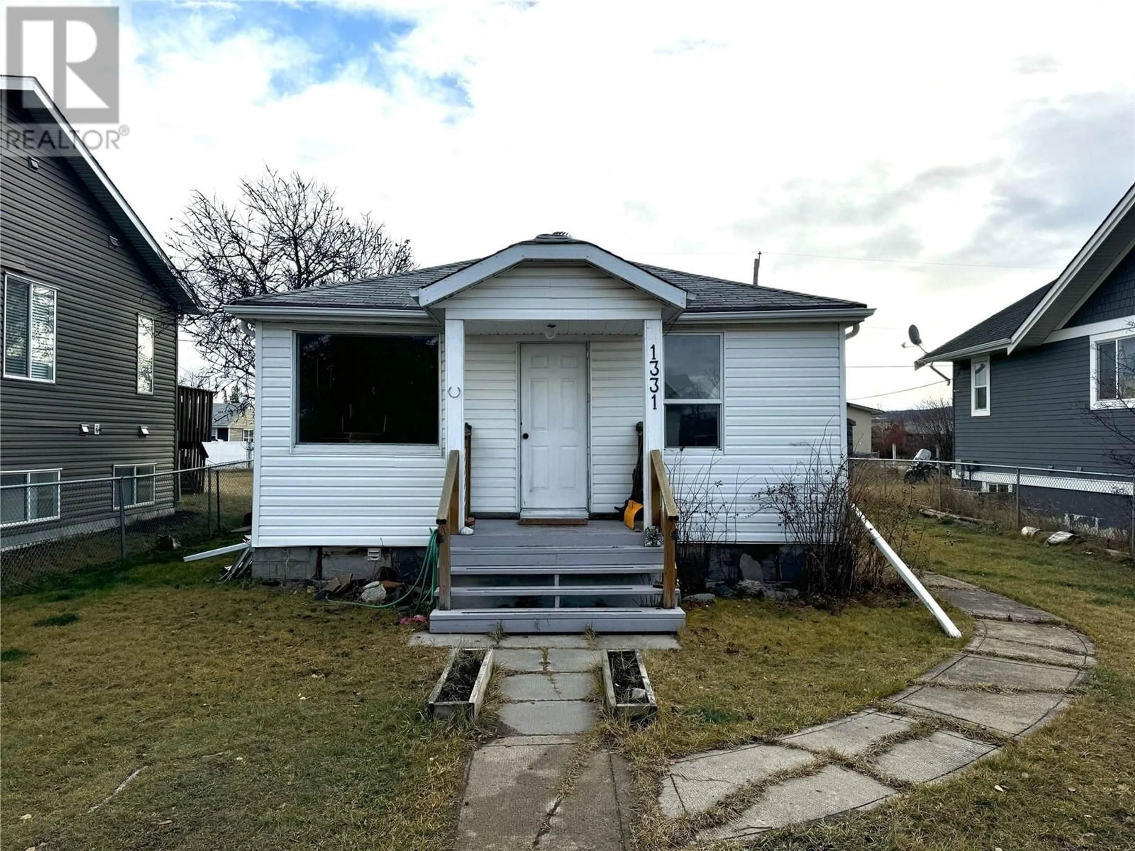 Frontside or backside of a home, cottage for 1331 105 Avenue, Dawson Creek British Columbia V1G2L9