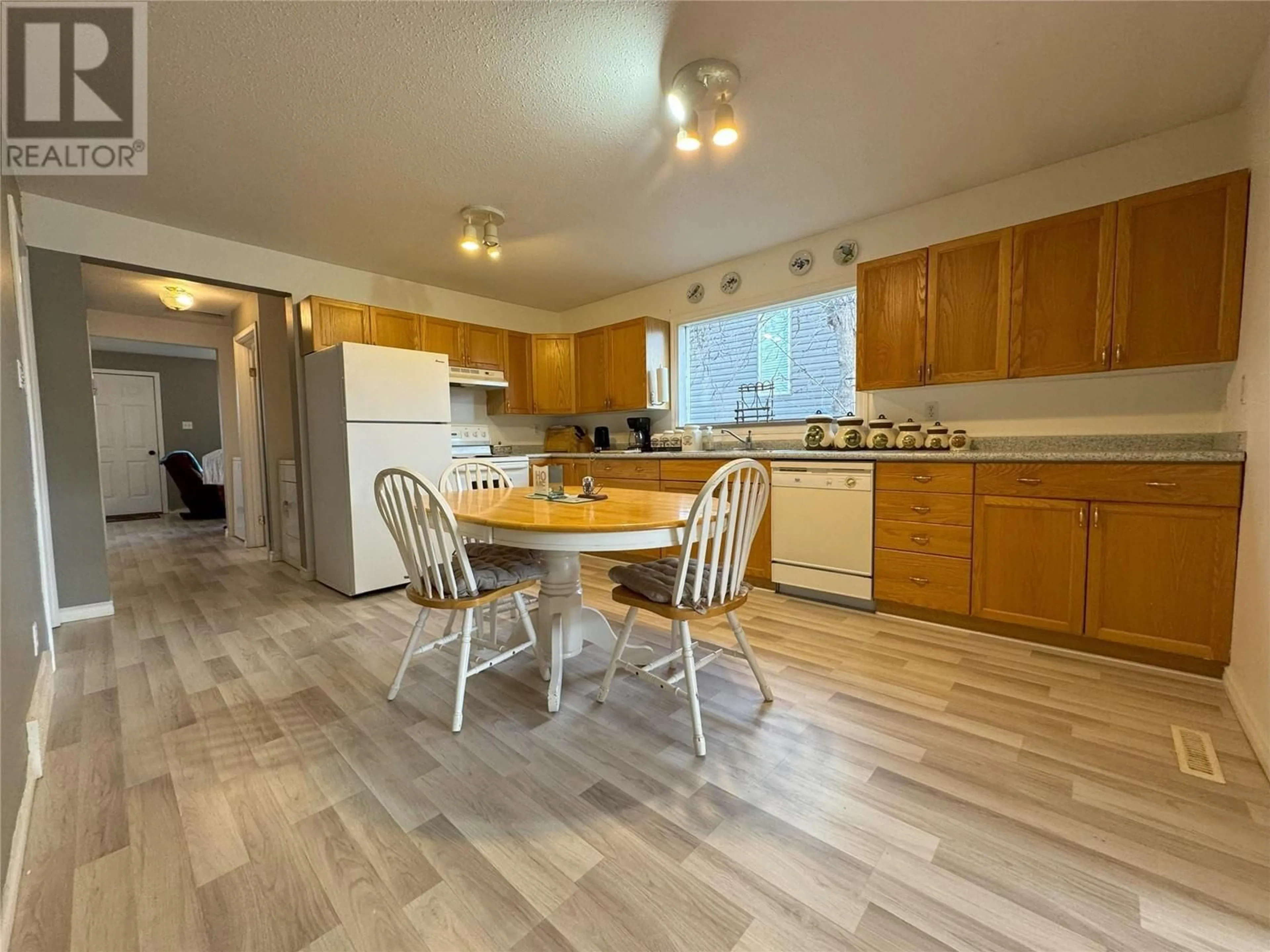 Open concept kitchen for 1331 105 Avenue, Dawson Creek British Columbia V1G2L9