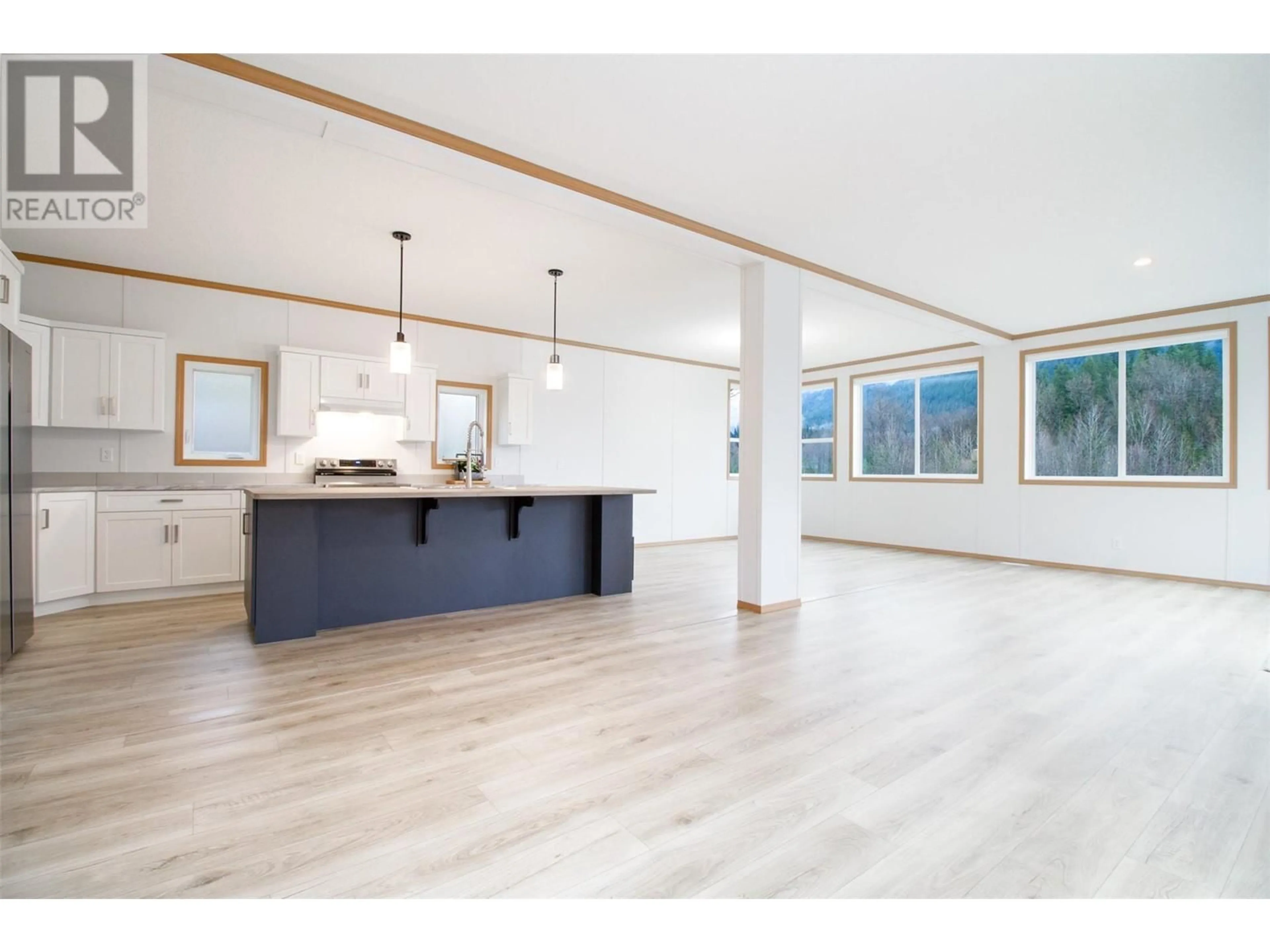 Open concept kitchen, wood/laminate floor for 19 - 1204 MAPLEWOOD STREET, Revelstoke British Columbia V0E2S0