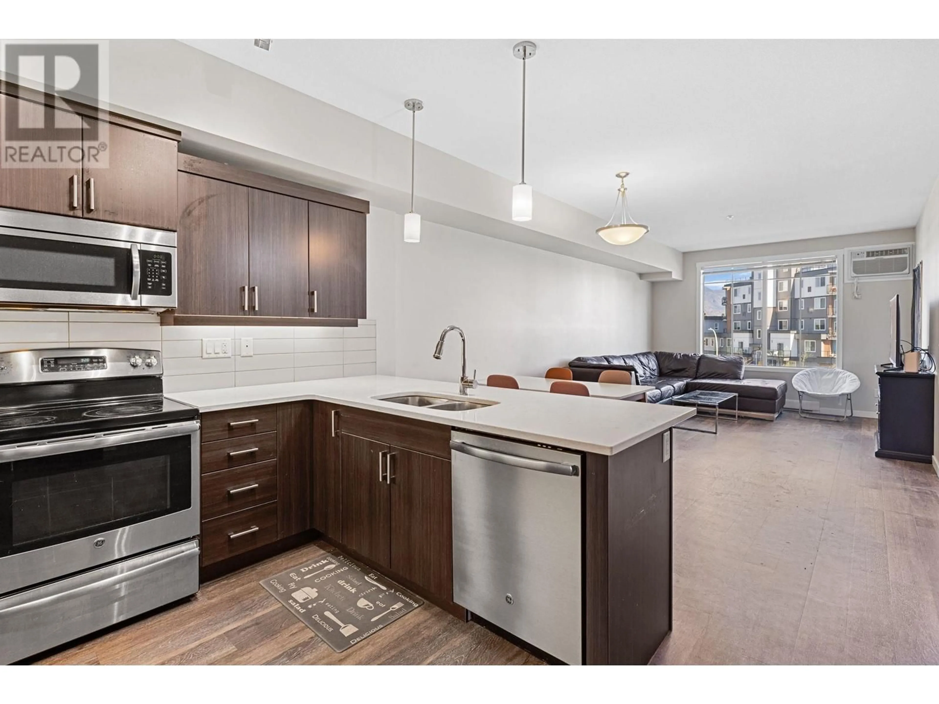 Open concept kitchen, unknown for 210 - 3731 CASORSO ROAD, Kelowna British Columbia V1W5E9