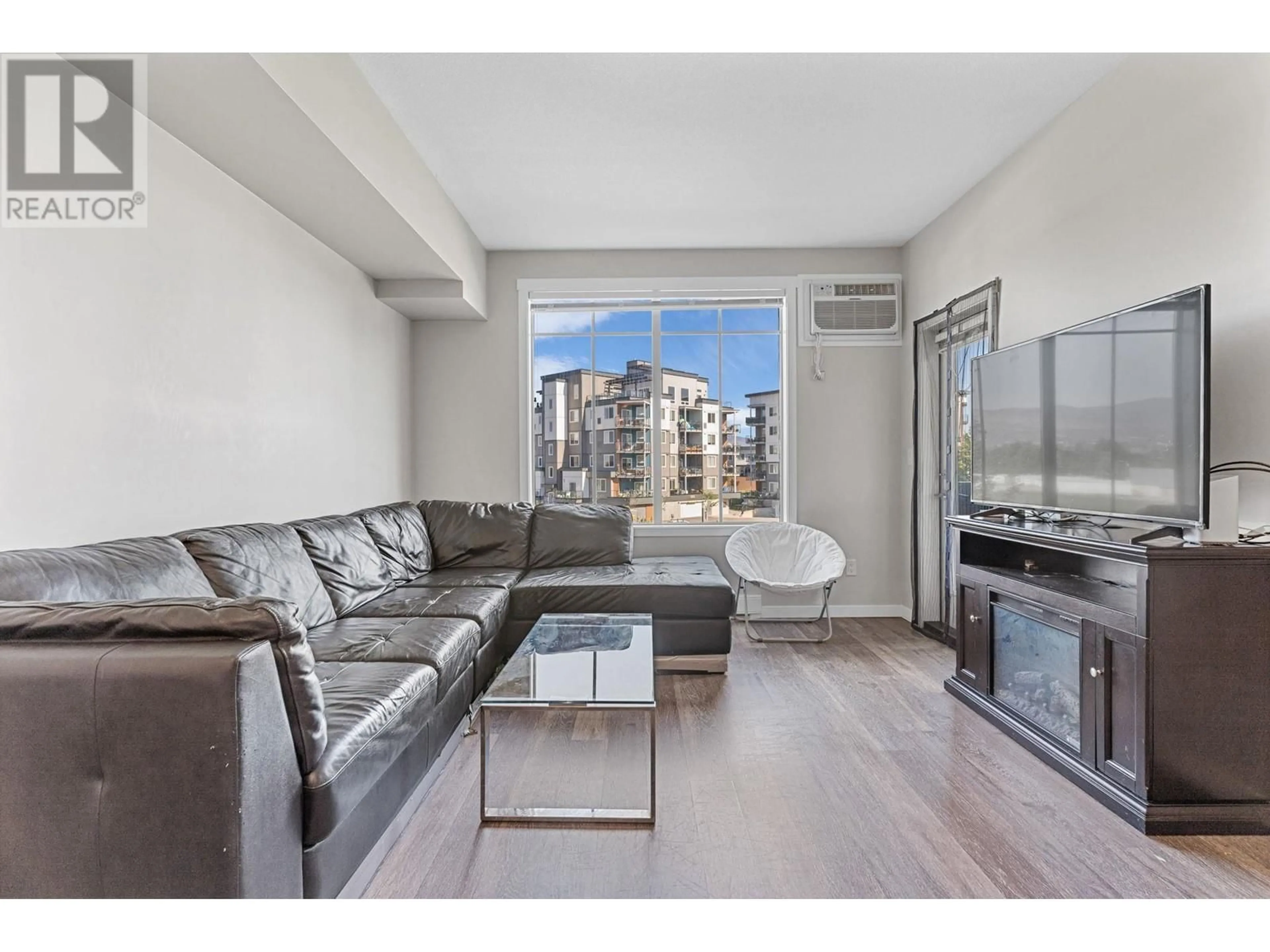 Living room, wood floors for 3731 Casorso Road Unit# 210, Kelowna British Columbia V1W5E9