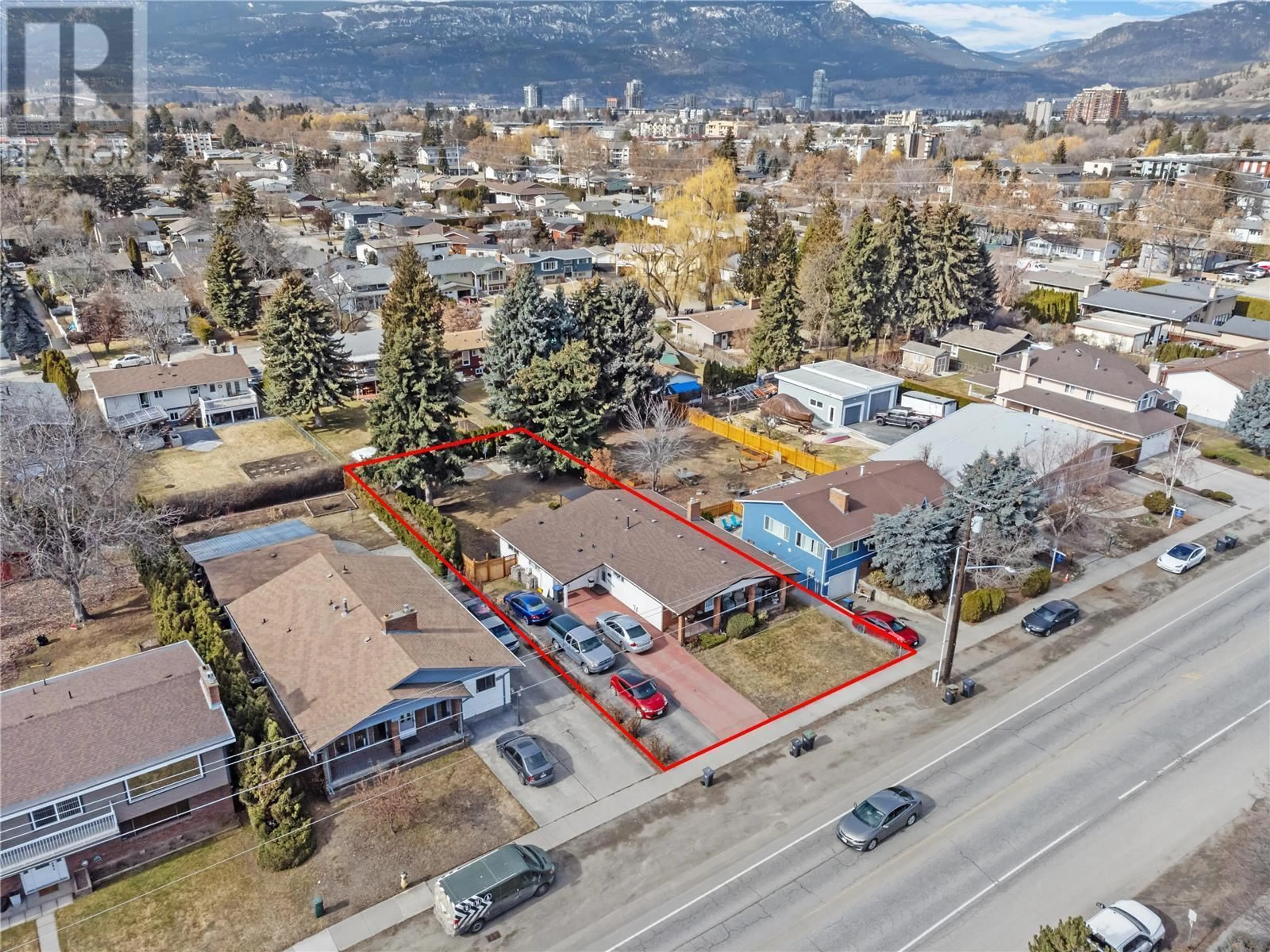 A pic from outside/outdoor area/front of a property/back of a property/a pic from drone, unknown for 2150 BURTCH ROAD, Kelowna British Columbia V1Y4B5