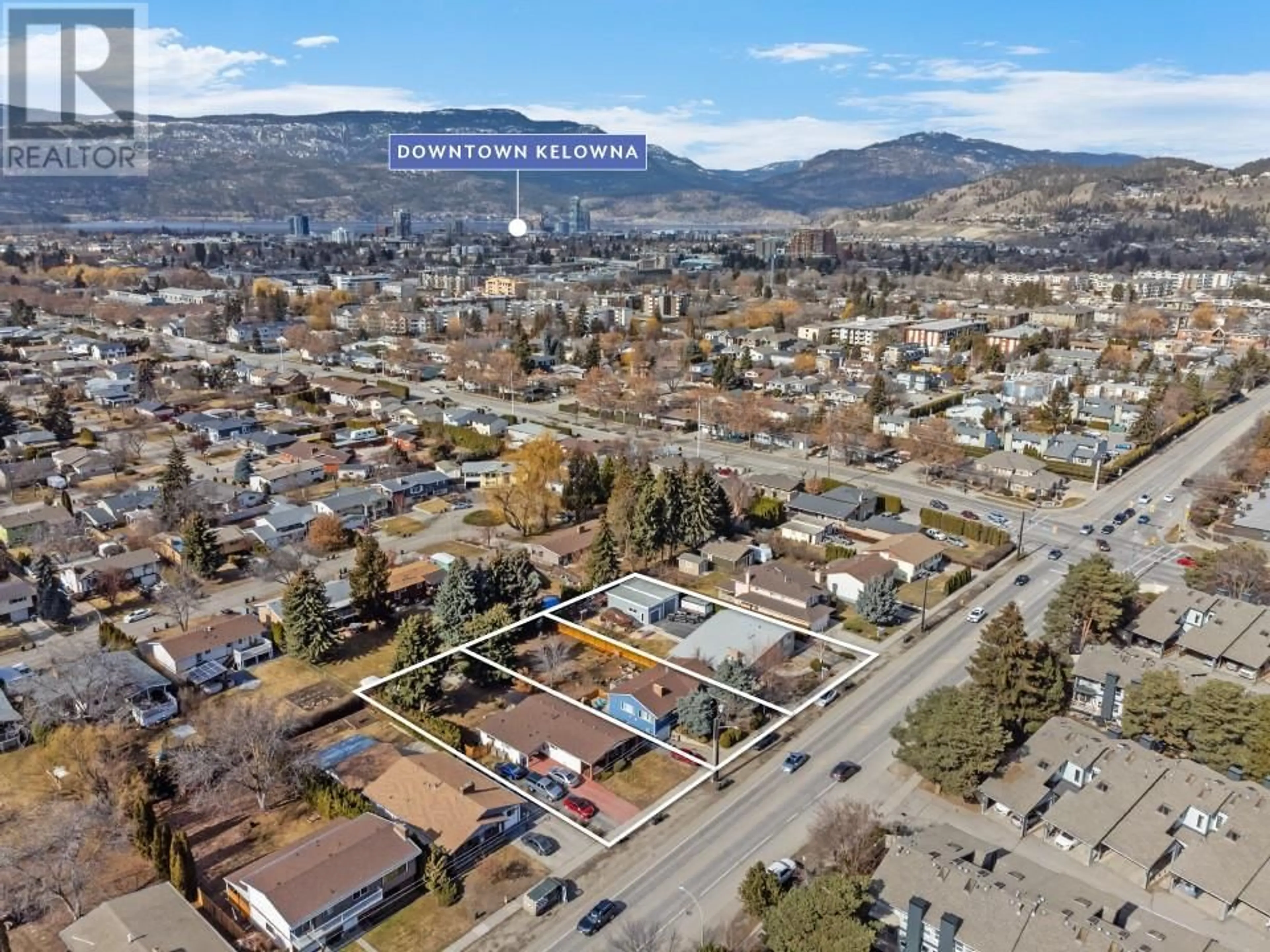 A pic from outside/outdoor area/front of a property/back of a property/a pic from drone, mountain view for 2150 BURTCH ROAD, Kelowna British Columbia V1Y4B5