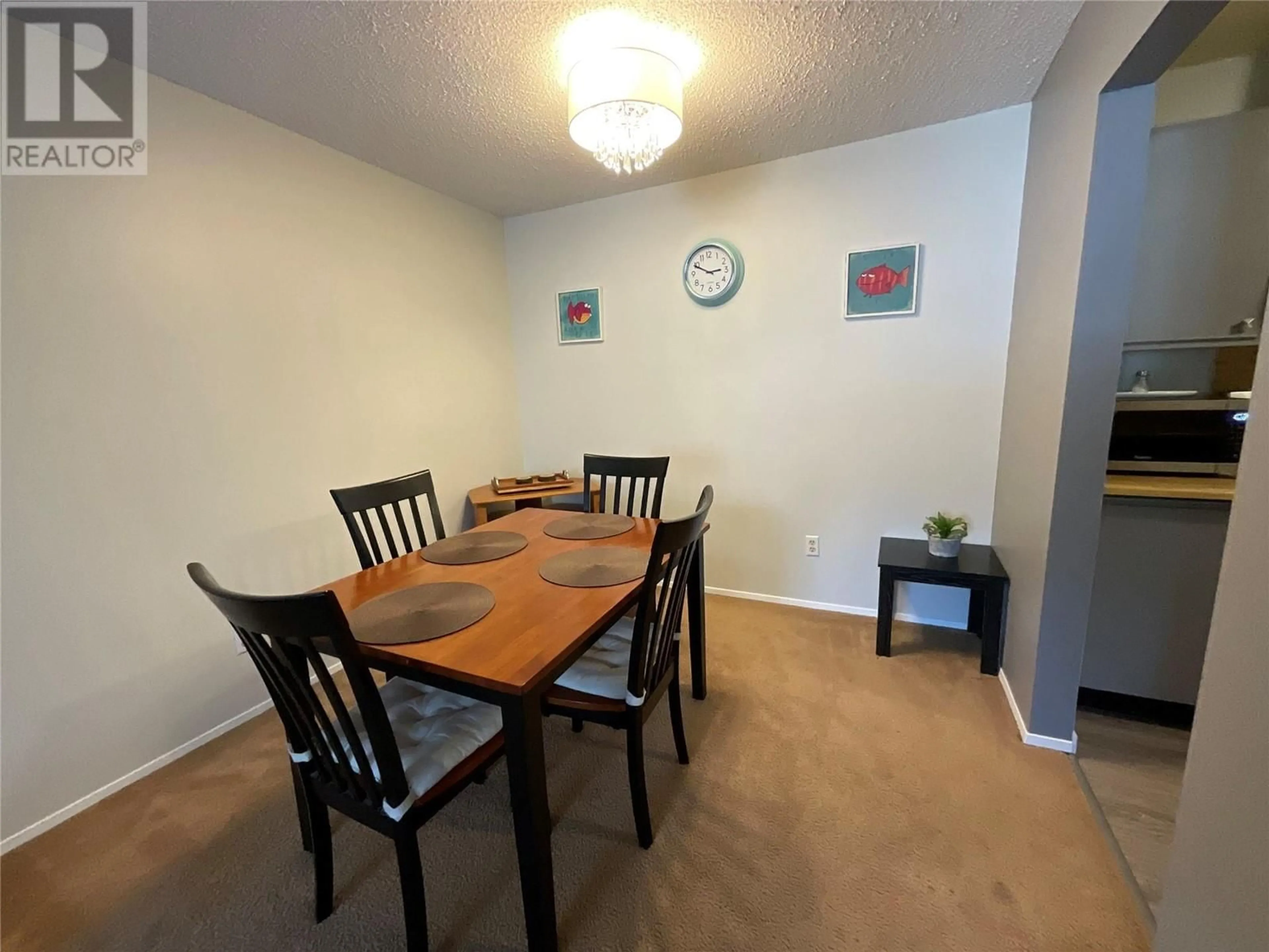 Dining room, wood floors, cottage for 108 Spruce Avenue Unit# 305, Tumbler Ridge British Columbia V0C2W0