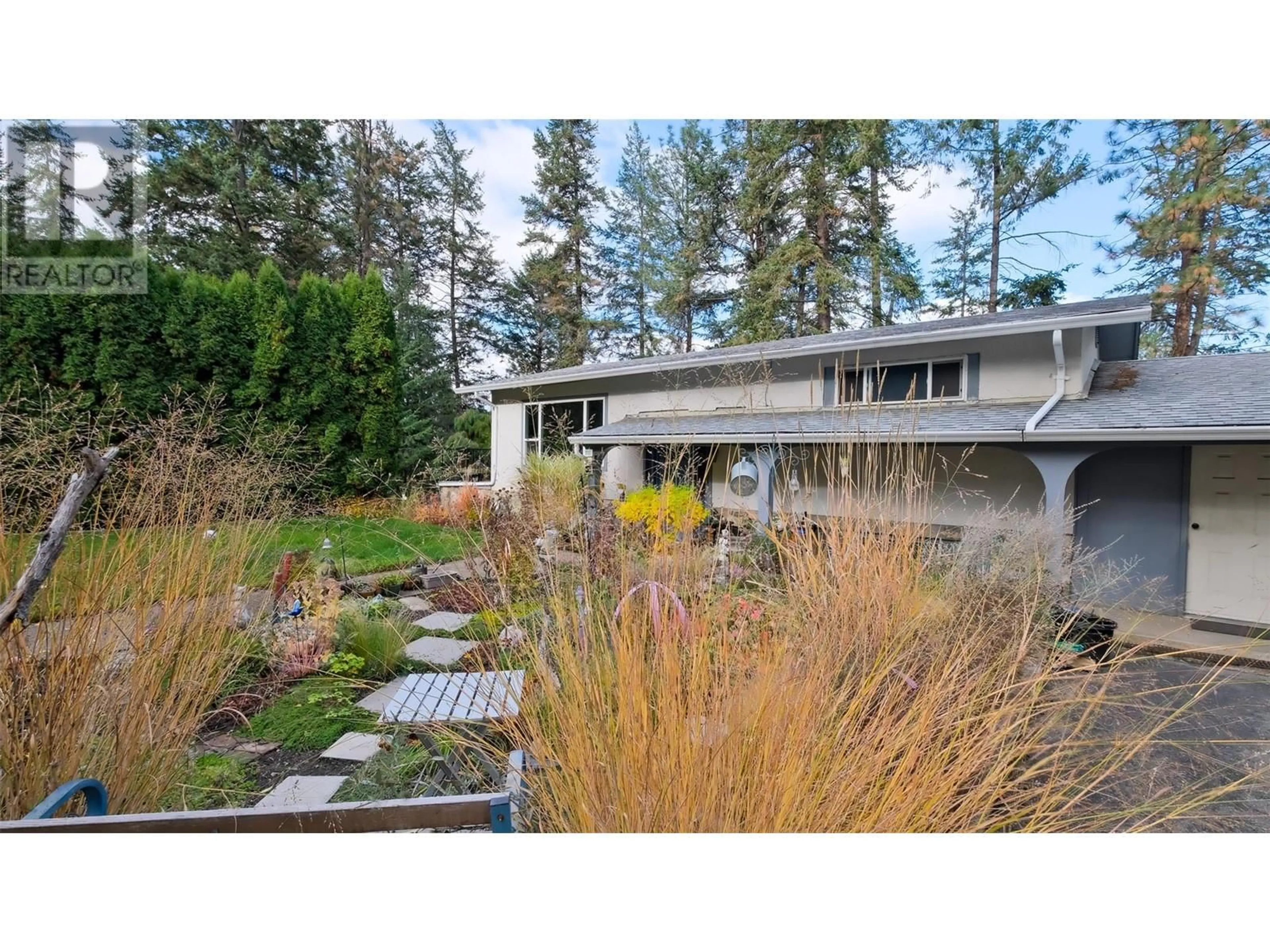 Frontside or backside of a home, cottage for 4099 Miller Road, Kelowna British Columbia V1W4C7