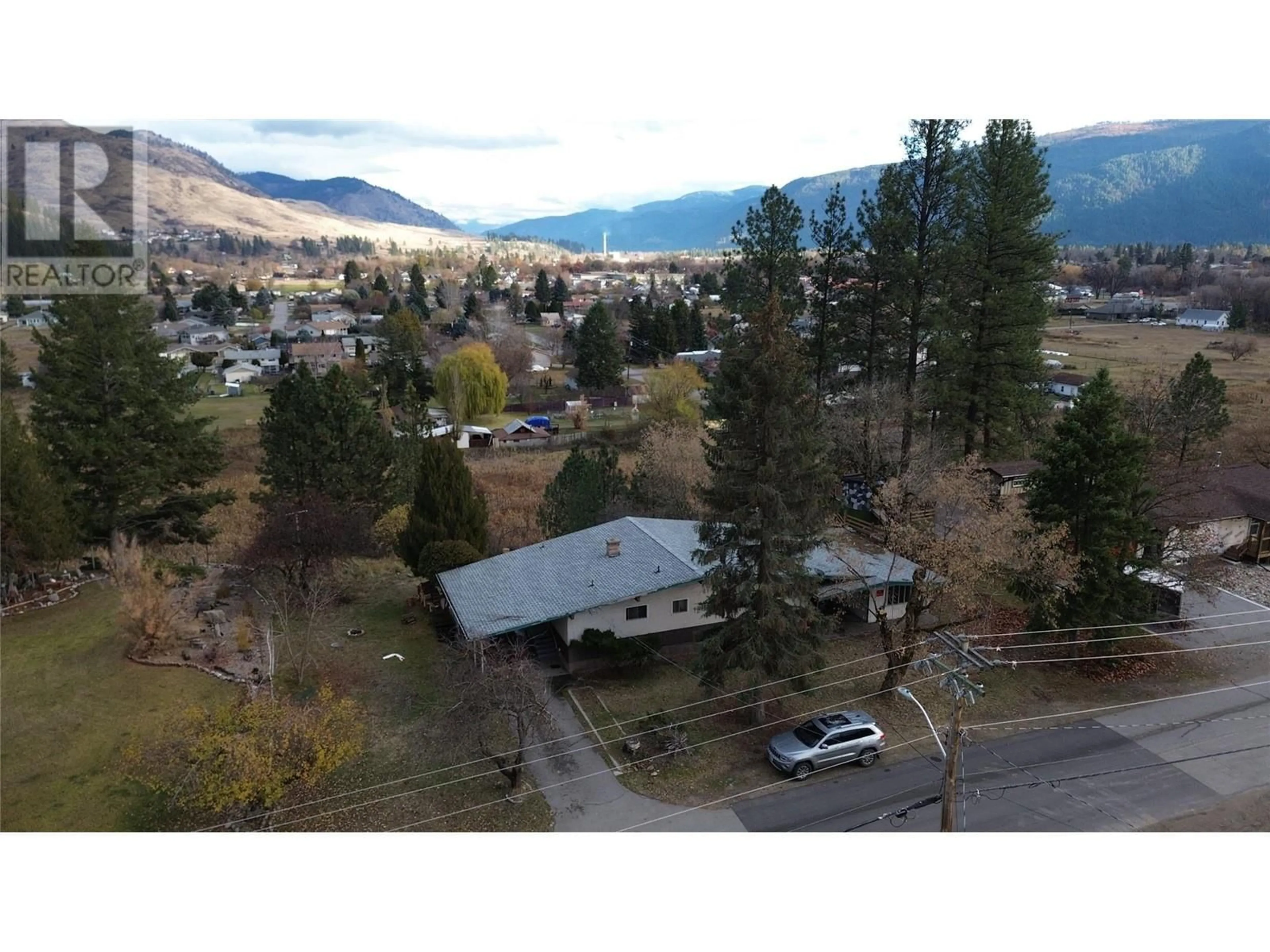 Frontside or backside of a home, the street view for 7746 McCallum View Drive, Grand Forks British Columbia V0H1H0