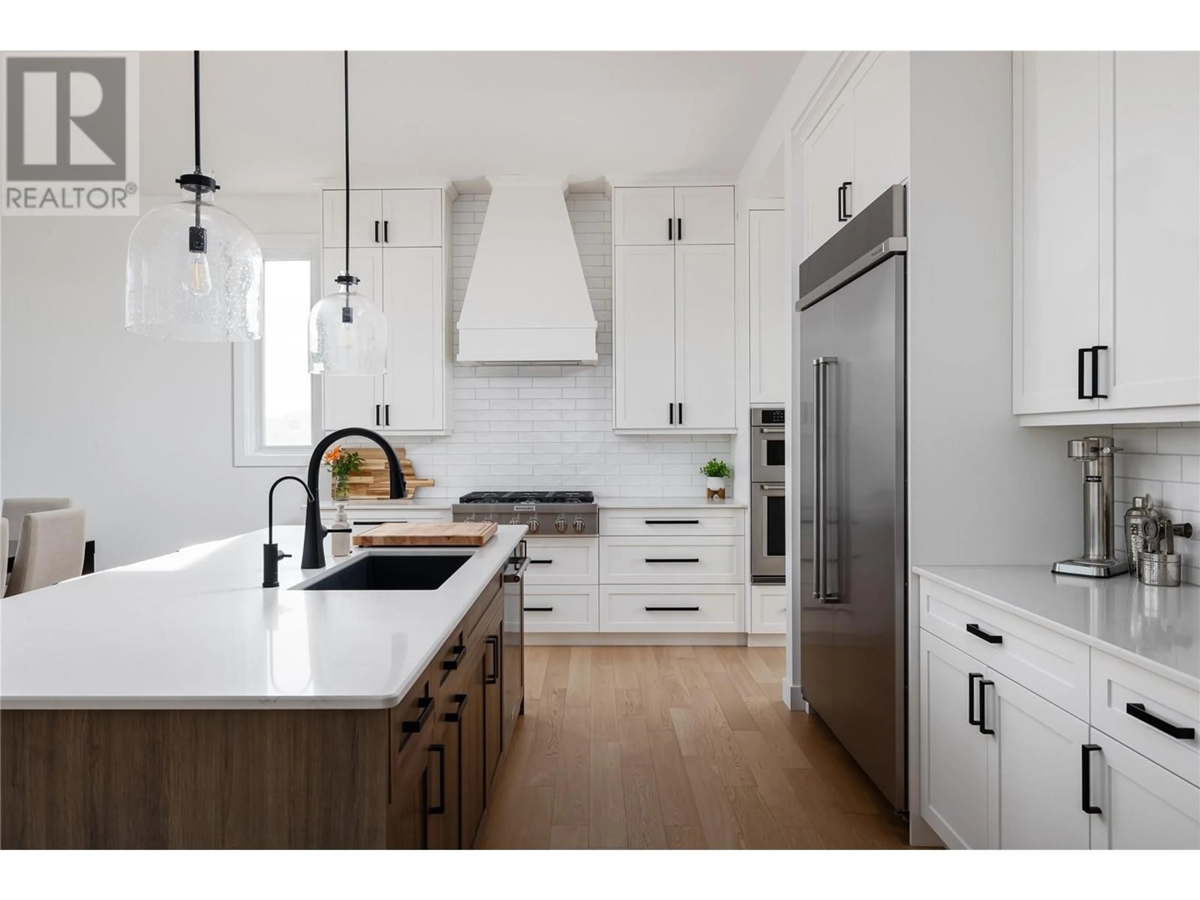 Contemporary kitchen, wood/laminate floor for 185 SARSONS DRIVE, Coldstream British Columbia V1B0B5