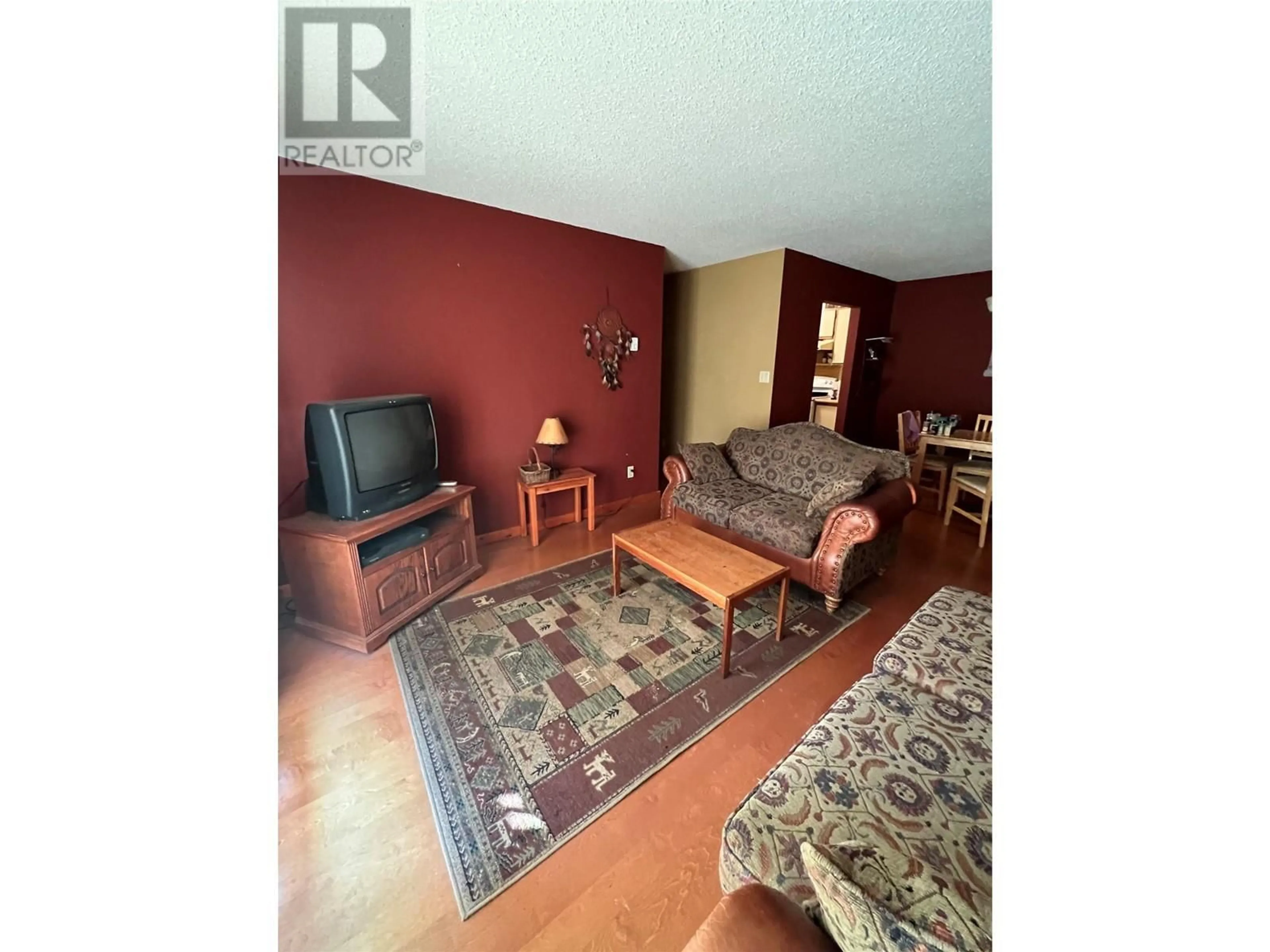Living room with furniture, unknown for 206 - 195 CHAMBERLAIN CRESCENT, Tumbler Ridge British Columbia V0C2W0