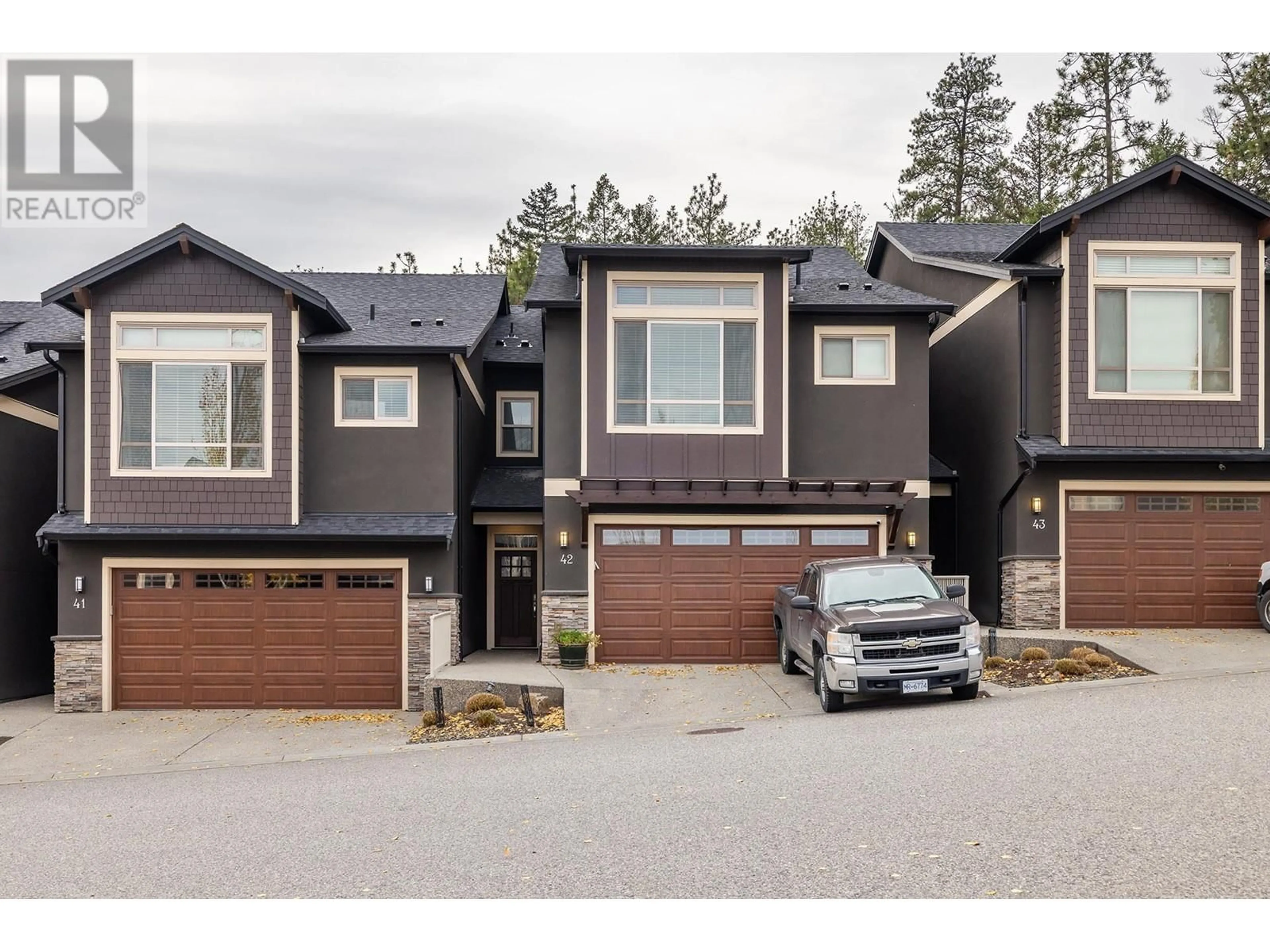 A pic from exterior of the house or condo, the street view for 1870 Rosealee Lane Unit# 42, West Kelowna British Columbia V1Z4E5