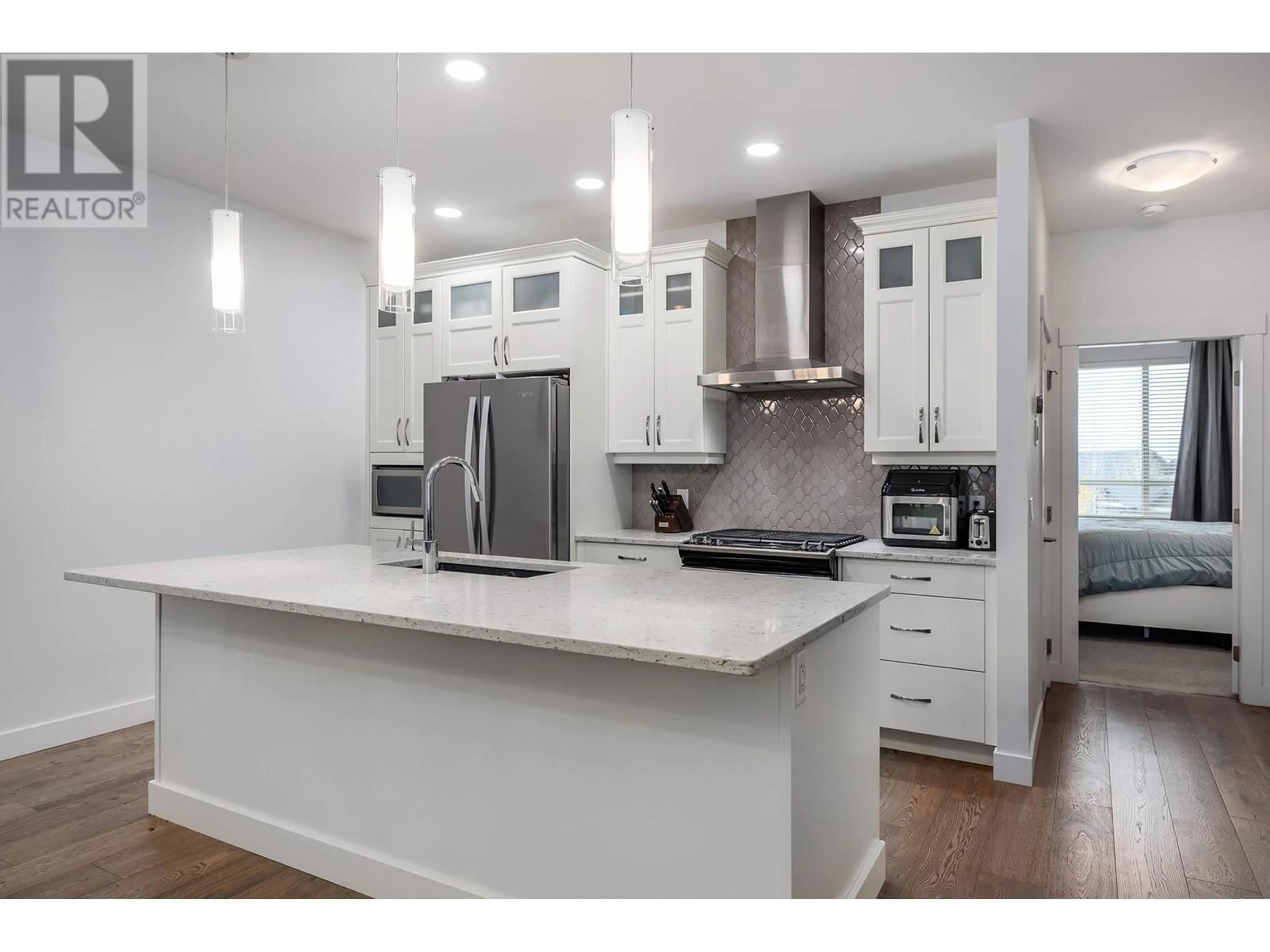 Open concept kitchen for 1870 Rosealee Lane Unit# 42, West Kelowna British Columbia V1Z4E5