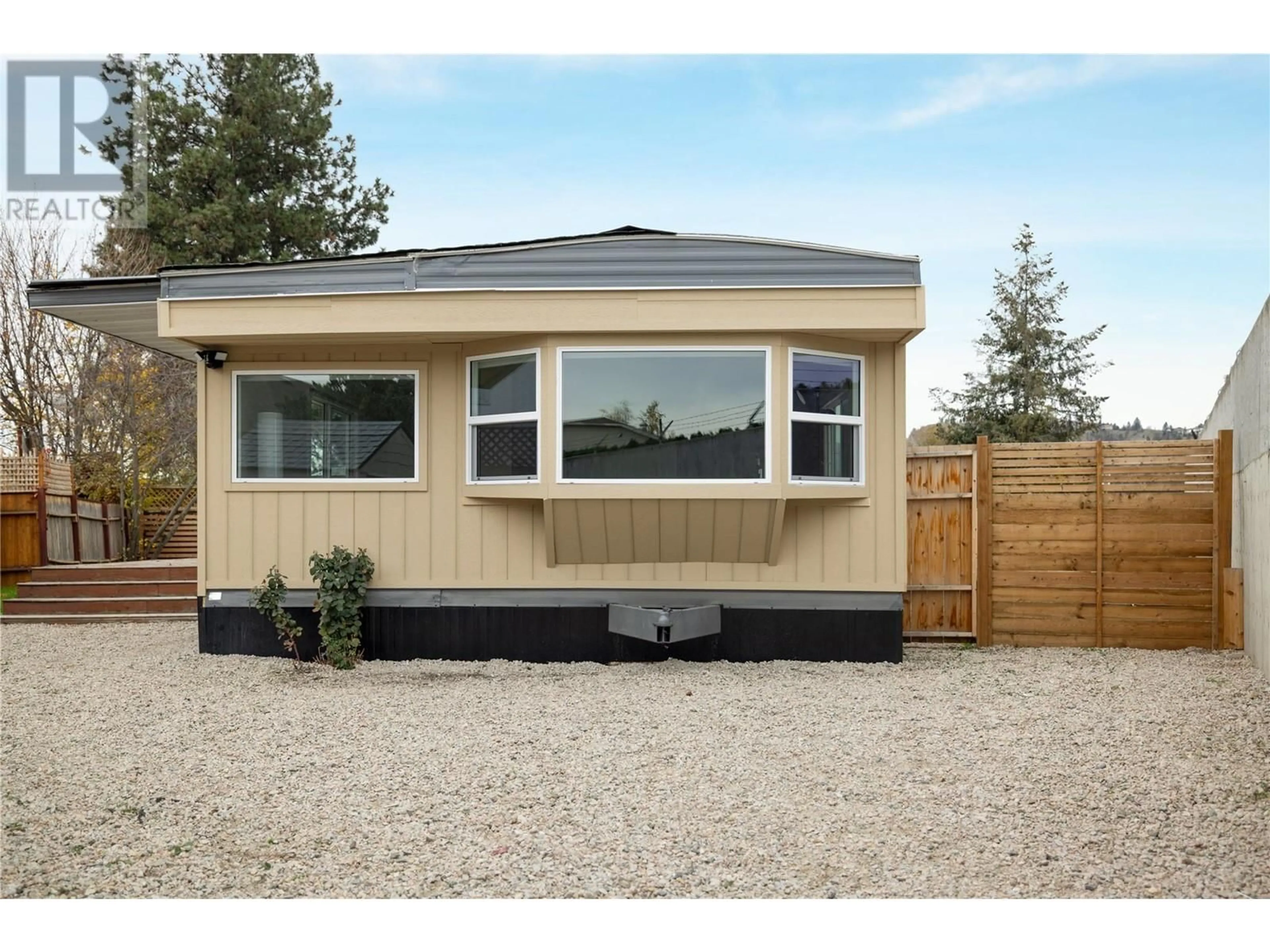 Home with vinyl exterior material for 1925 Baron Road Unit# 15, Kelowna British Columbia V1W2R5