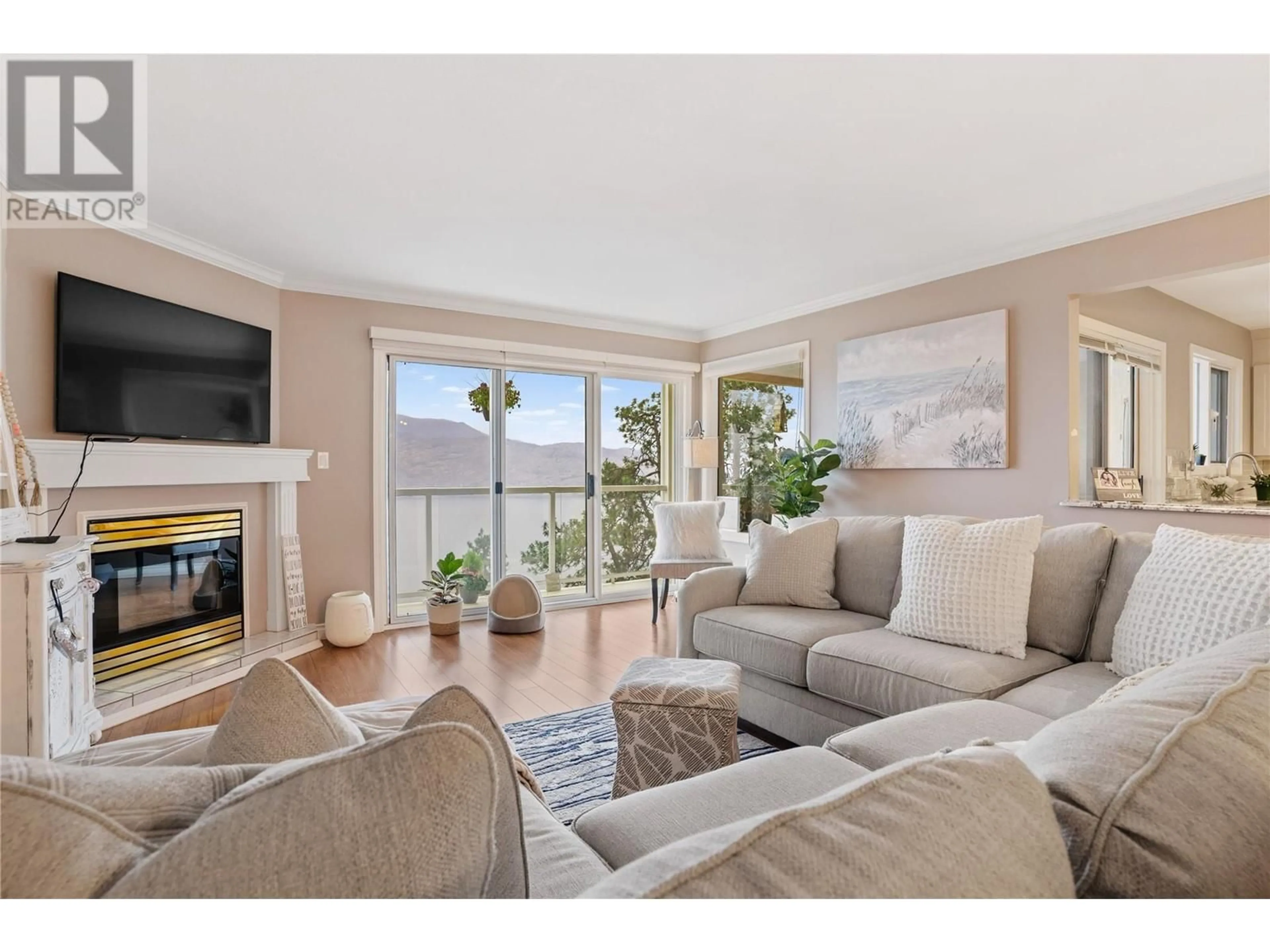 Living room, wood floors for 4460 Ponderosa Drive Unit# 105, Peachland British Columbia V0H1X5