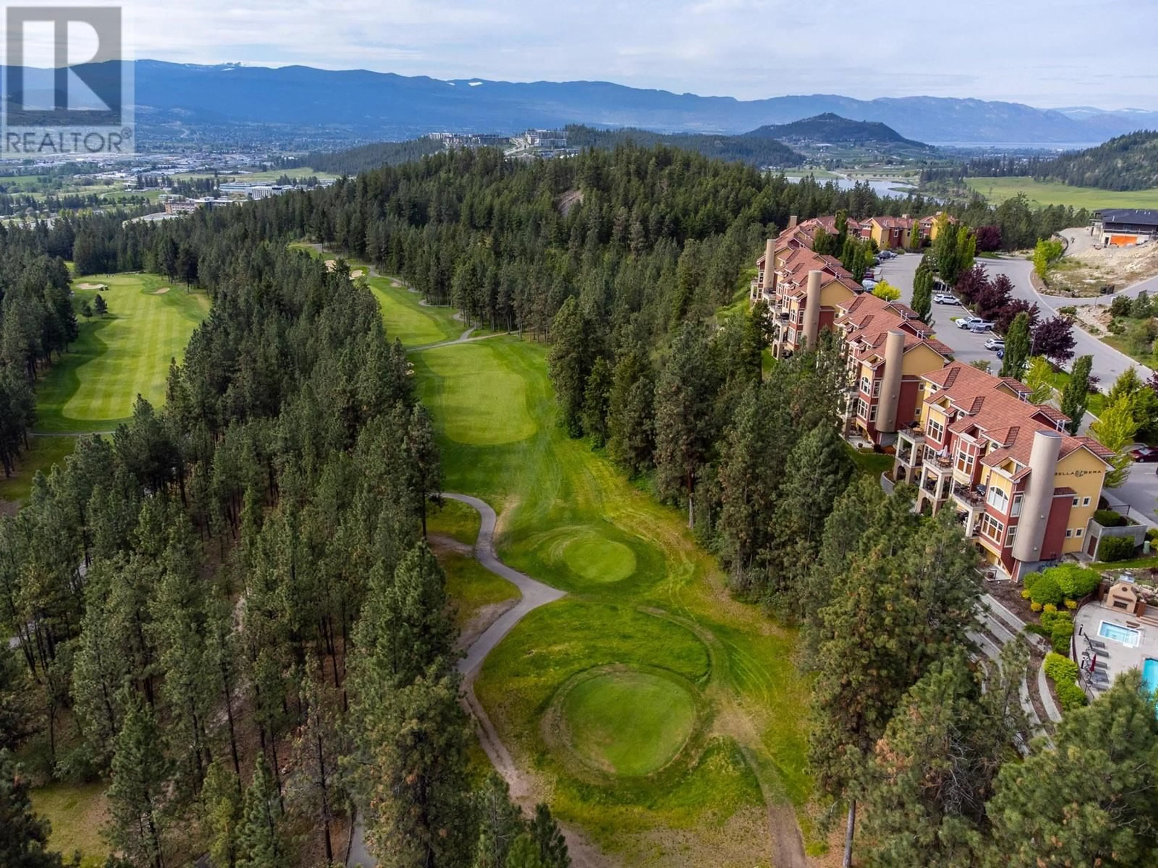 A pic from exterior of the house or condo, mountain for 1795 Country Club Drive Unit# 102, Kelowna British Columbia V1V2V9