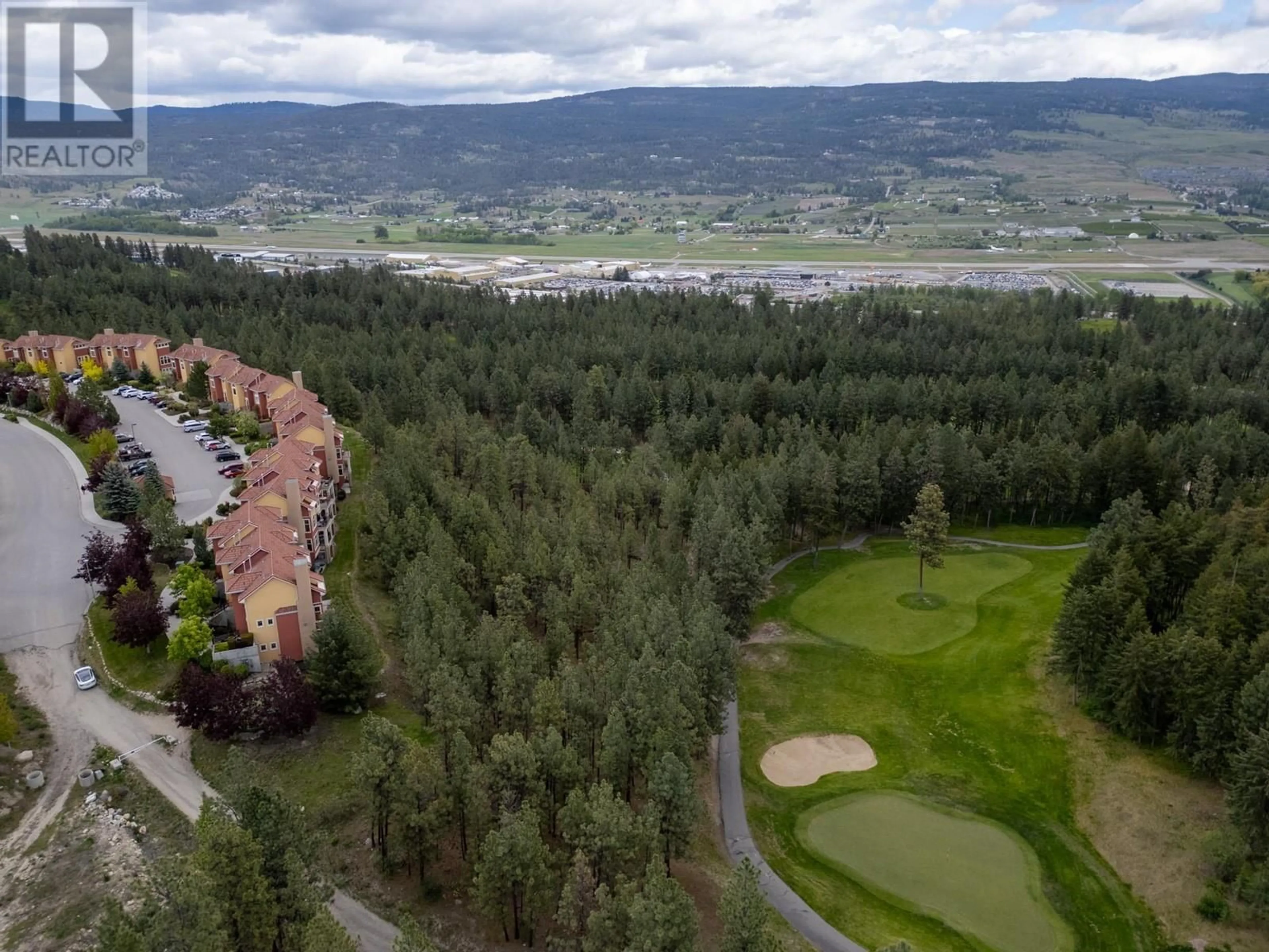 A pic from exterior of the house or condo, mountain for 1795 Country Club Drive Unit# 102, Kelowna British Columbia V1V2V9