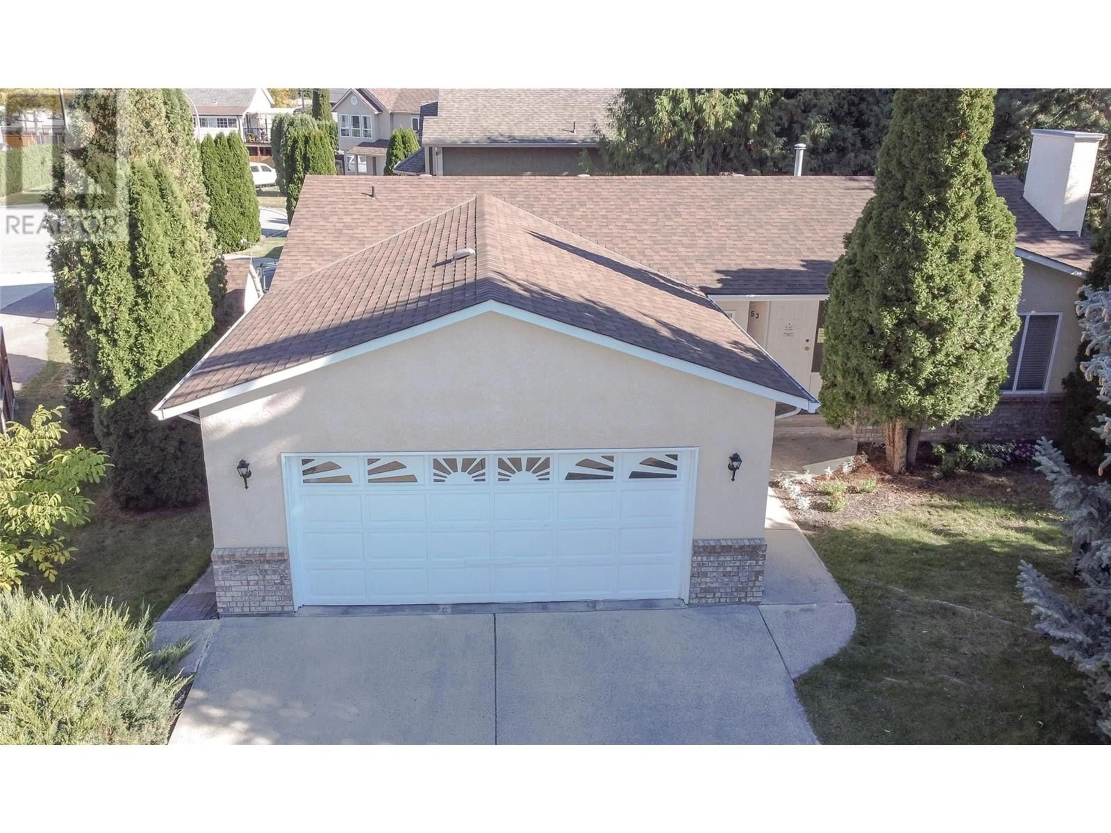 Frontside or backside of a home, the street view for 1053 Aldon Road, Kelowna British Columbia V1X6X8