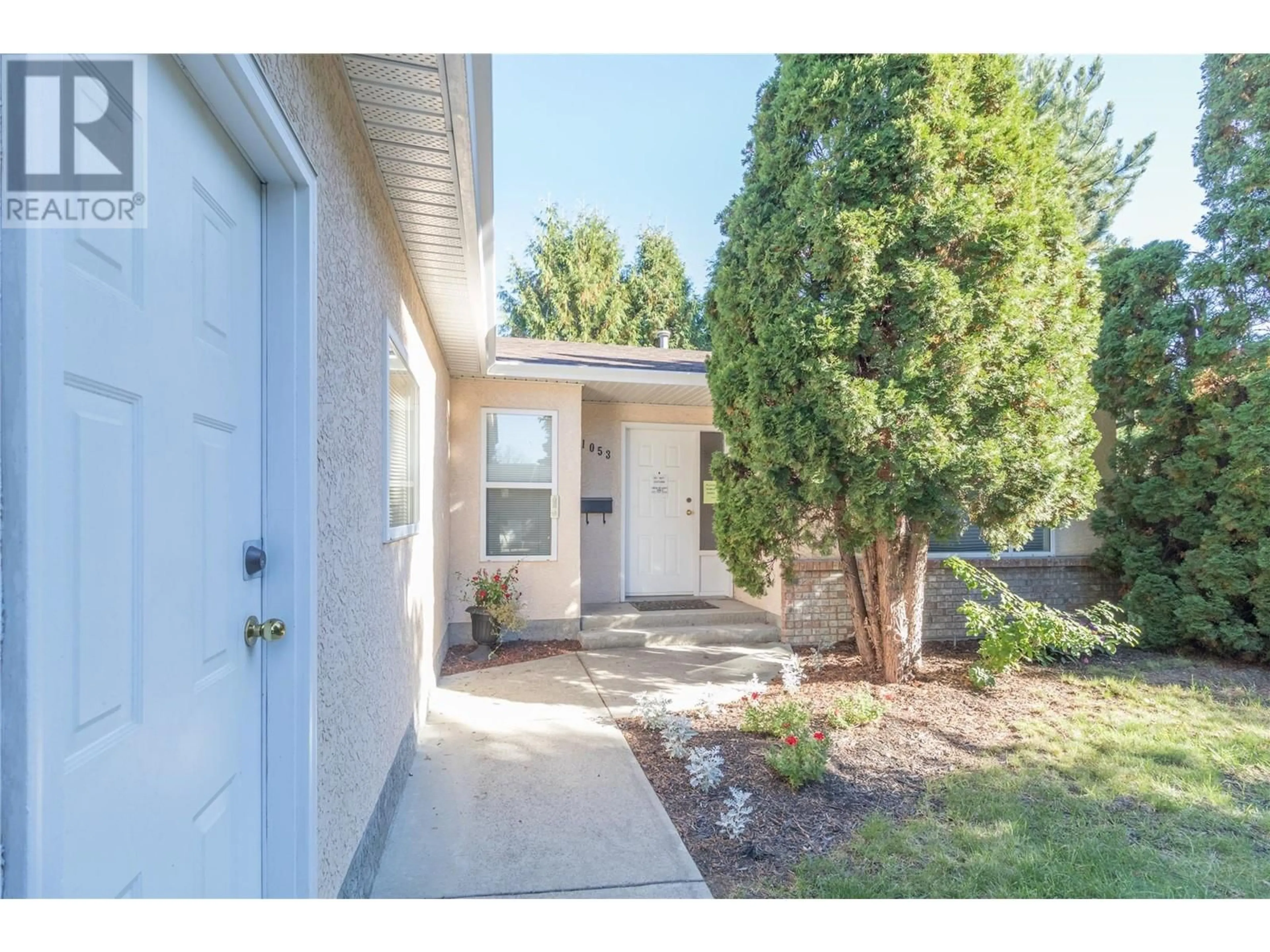 Frontside or backside of a home, the street view for 1053 Aldon Road, Kelowna British Columbia V1X6X8