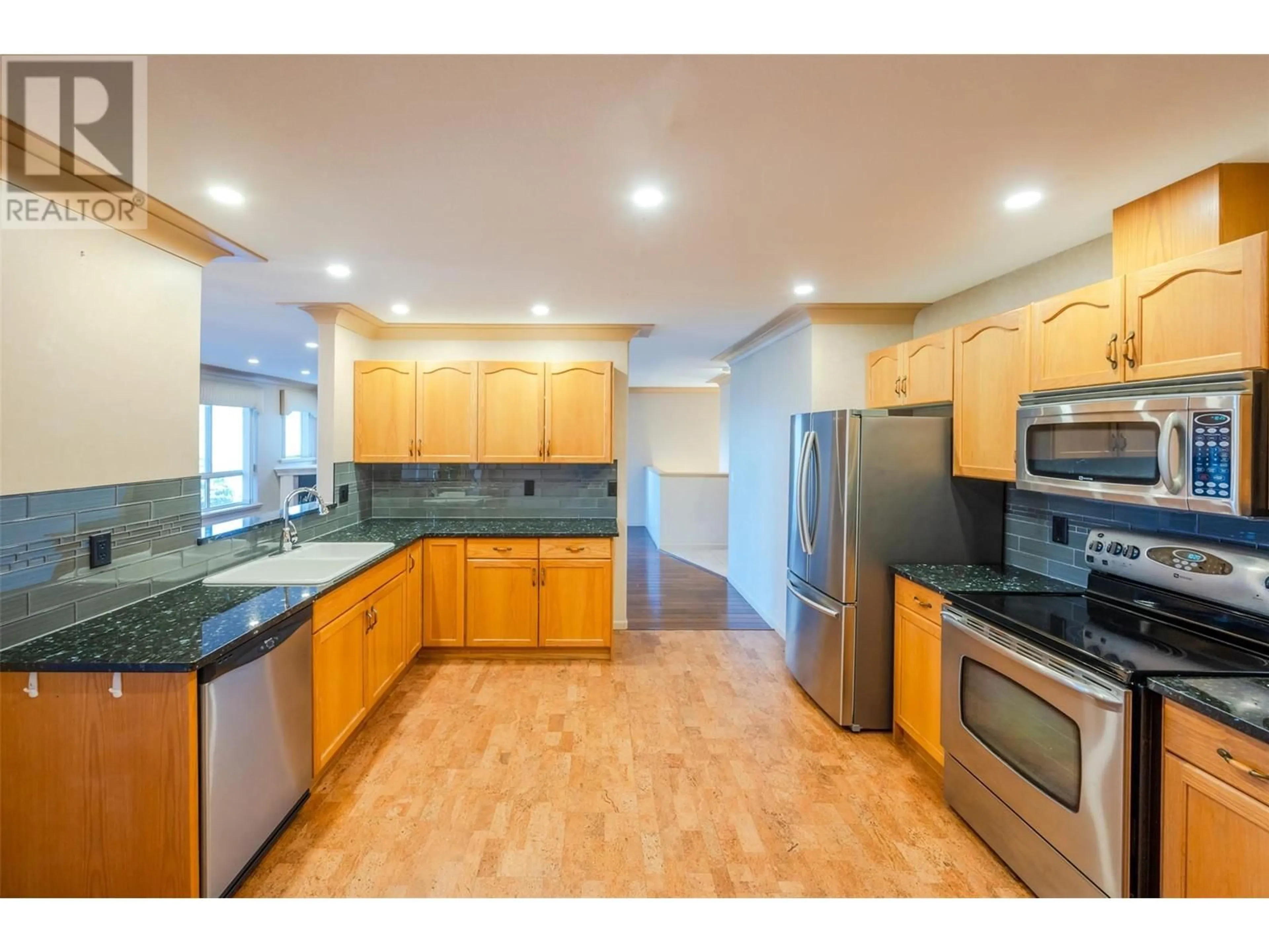 Open concept kitchen for 3948 Finnerty Road Unit# 114, Penticton British Columbia V2A8P8